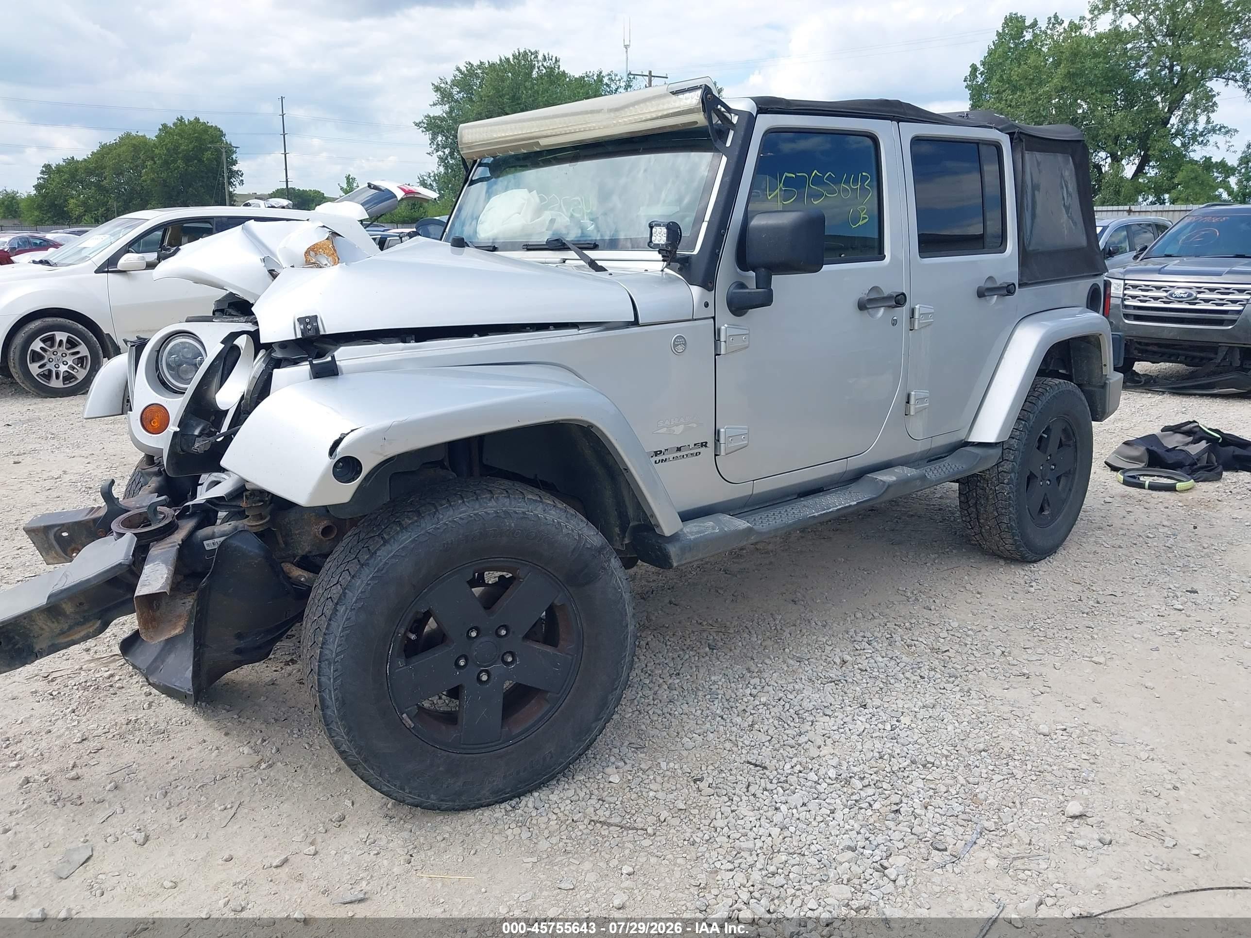2011 Jeep Wrangler Unlimited Sahara Silver vin: 1J4BA5H14BL512324