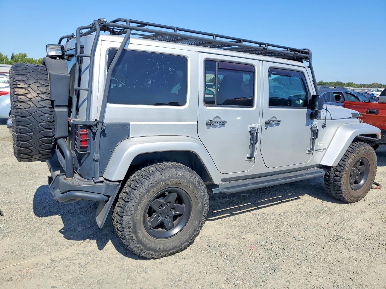 2011 Jeep Wrangler Unlimited Sahara Silver vin: 1J4BA5H14BL547087