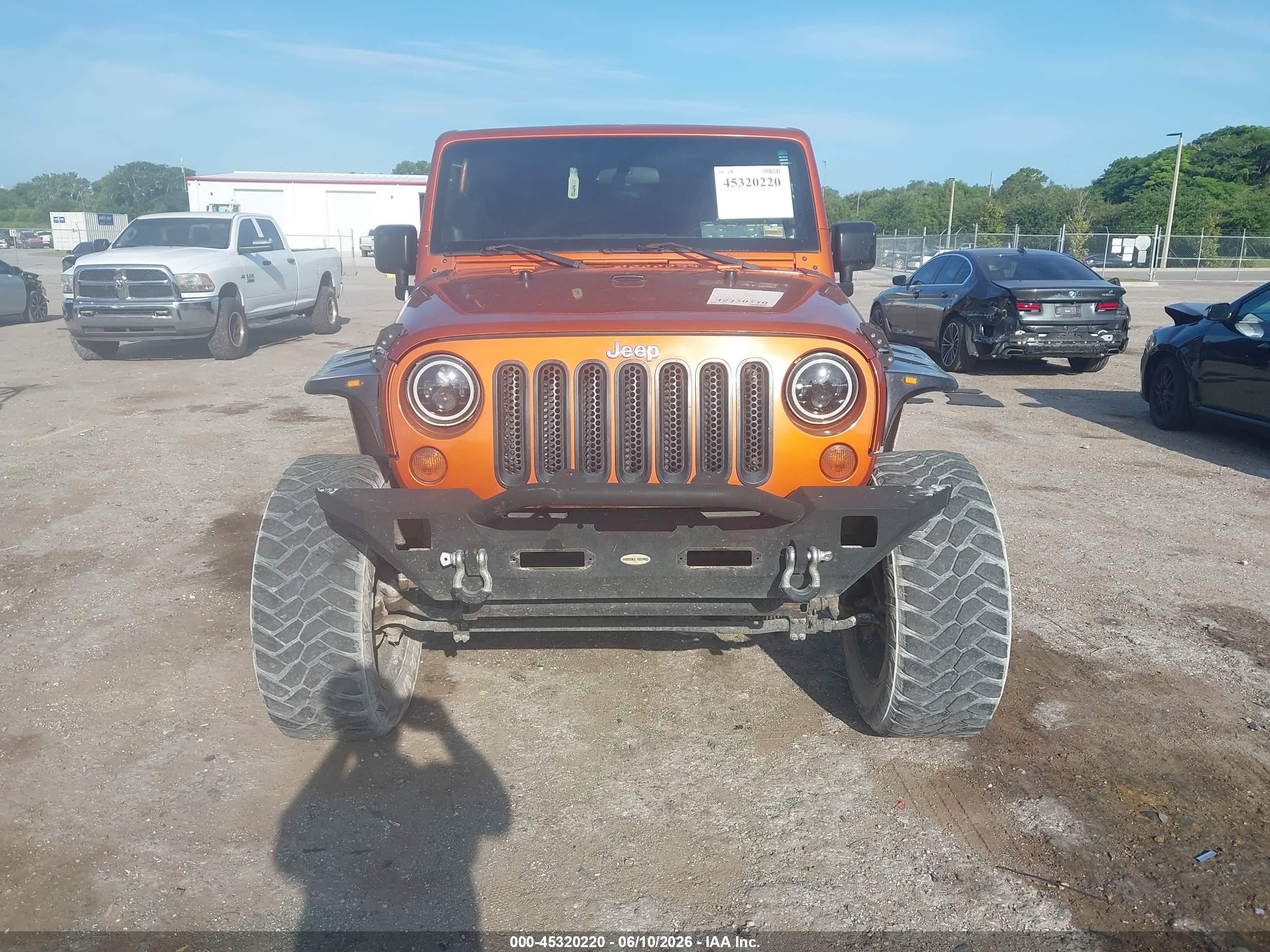 2011 Jeep Wrangler Unlimited Sahara Orange vin: 1J4BA5H15BL632021