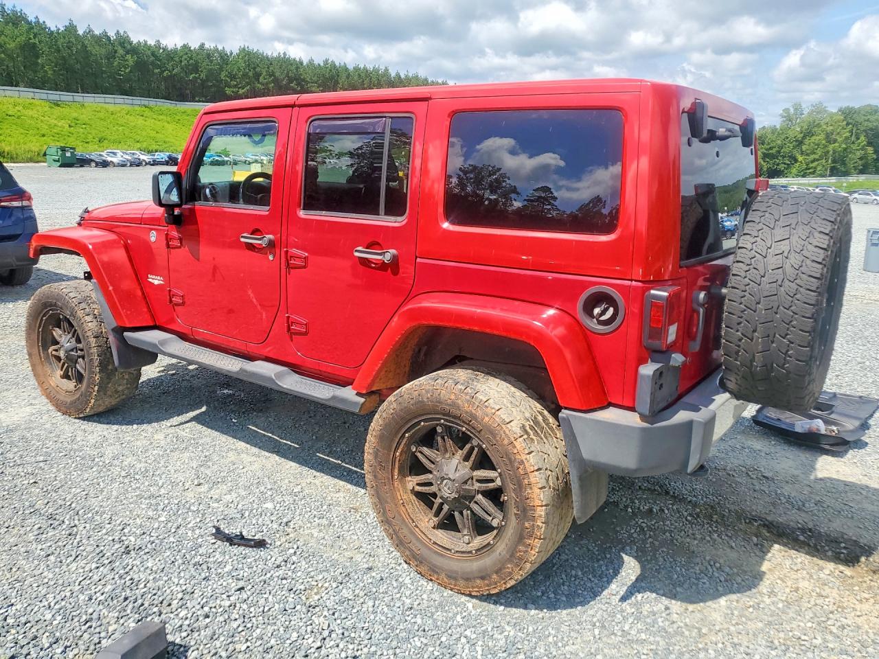 2011 Jeep Wrangler Unlimited Sahara Red vin: 1J4BA5H15BL638336