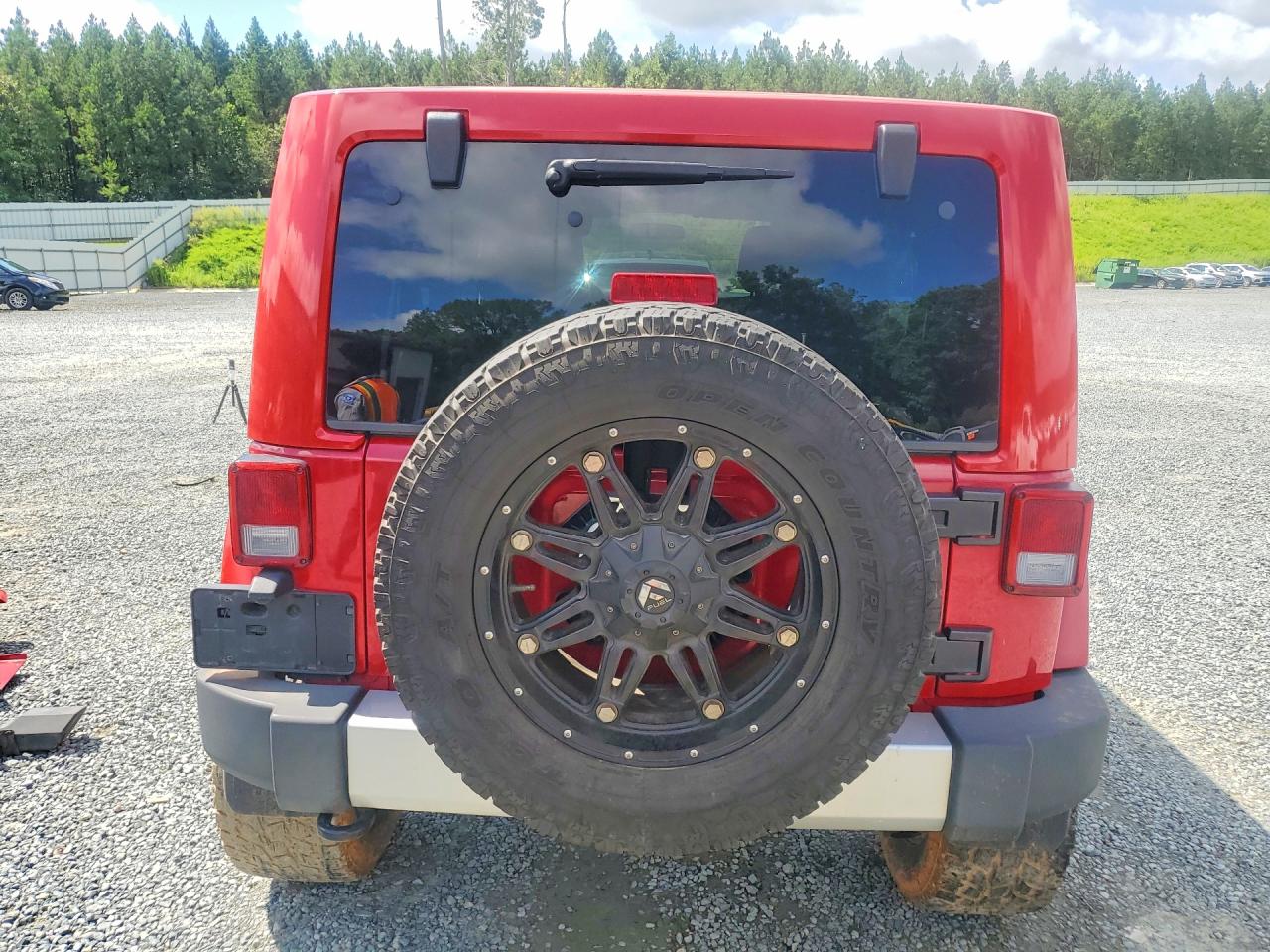 2011 Jeep Wrangler Unlimited Sahara Red vin: 1J4BA5H15BL638336