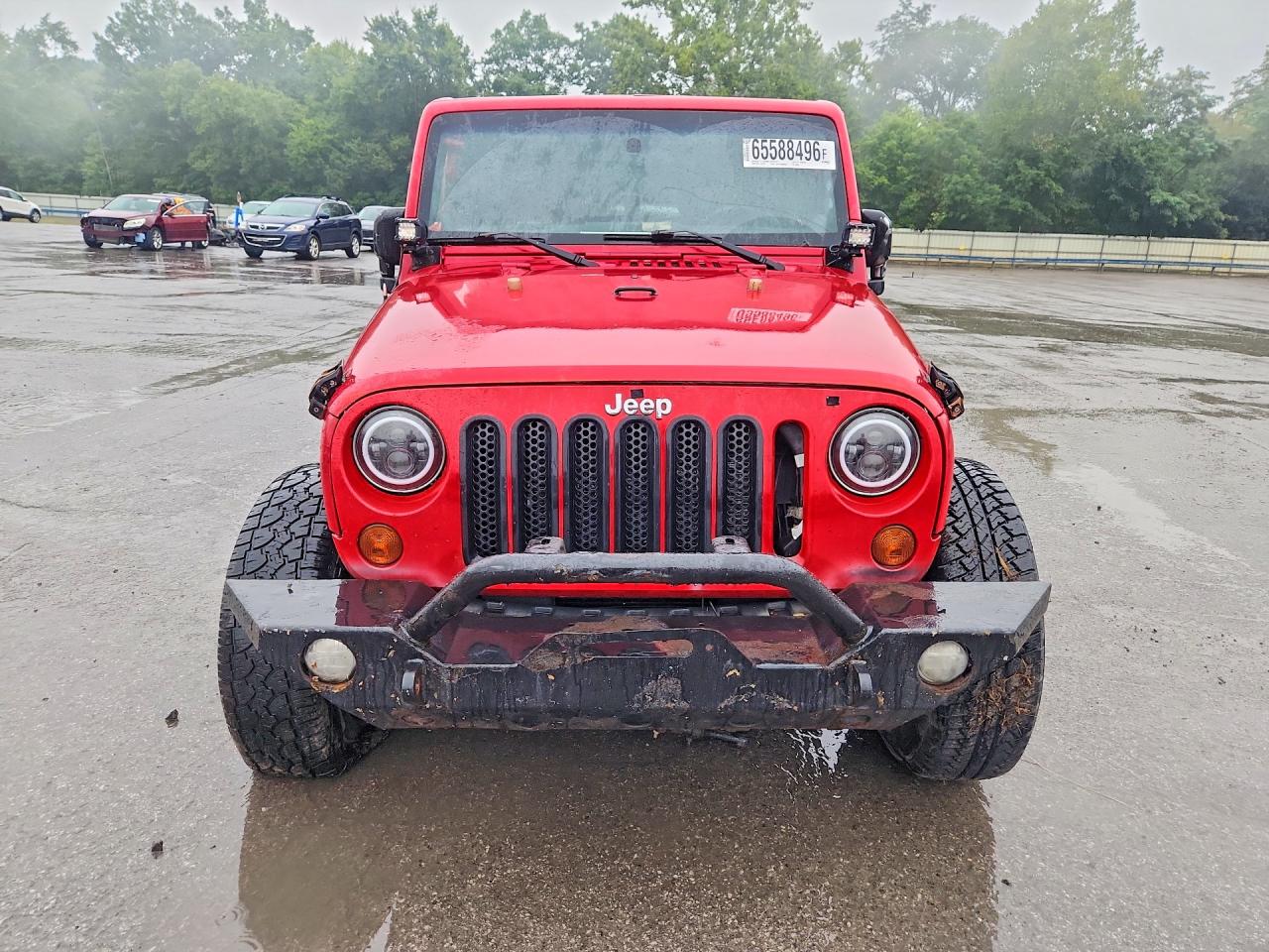 2011 Jeep Wrangler Unlimited Sahara Red vin: 1J4BA5H15BL638496