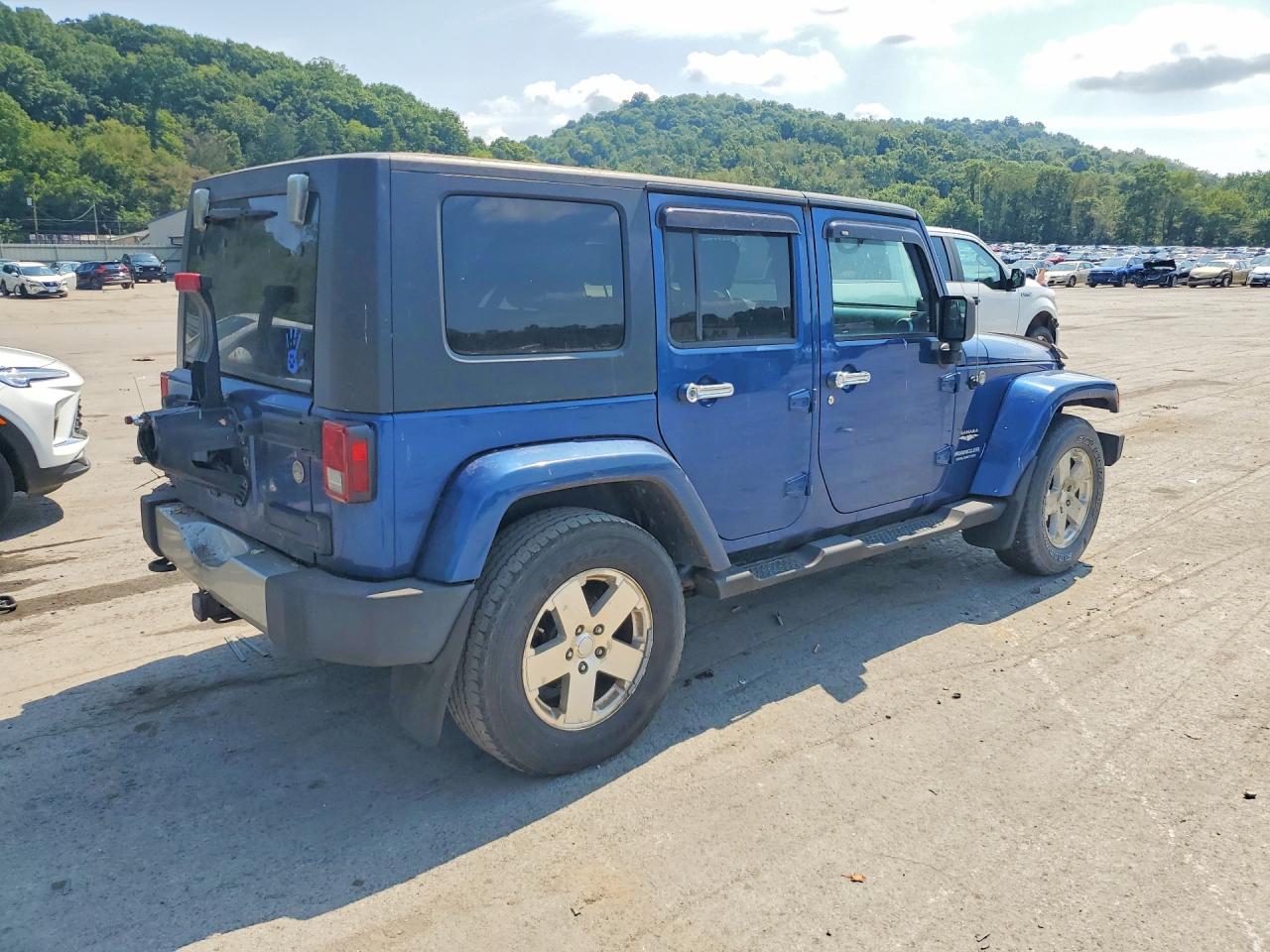 2010 Jeep Wrangler Unlimited Sahara Blue vin: 1J4BA5H17AL116130
