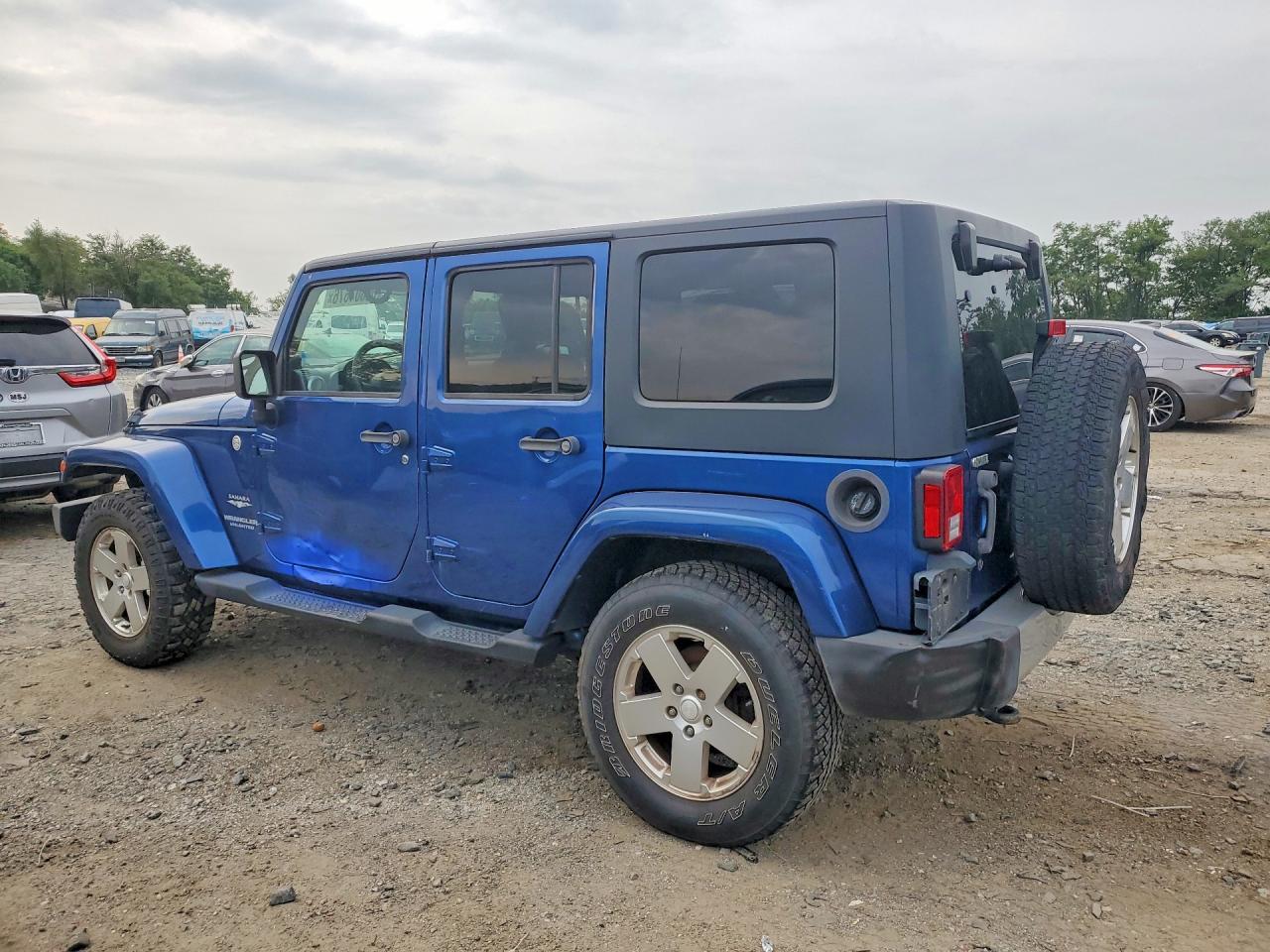 2010 Jeep Wrangler Unlimited Sahara Blue vin: 1J4BA5H17AL179941