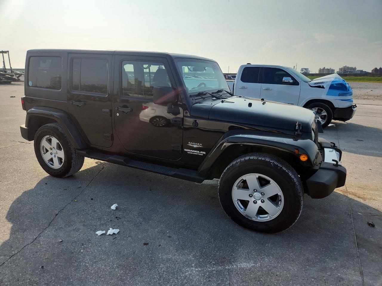 2011 Jeep Wrangler Unlimited Sahara Black vin: 1J4BA5H17BL533362