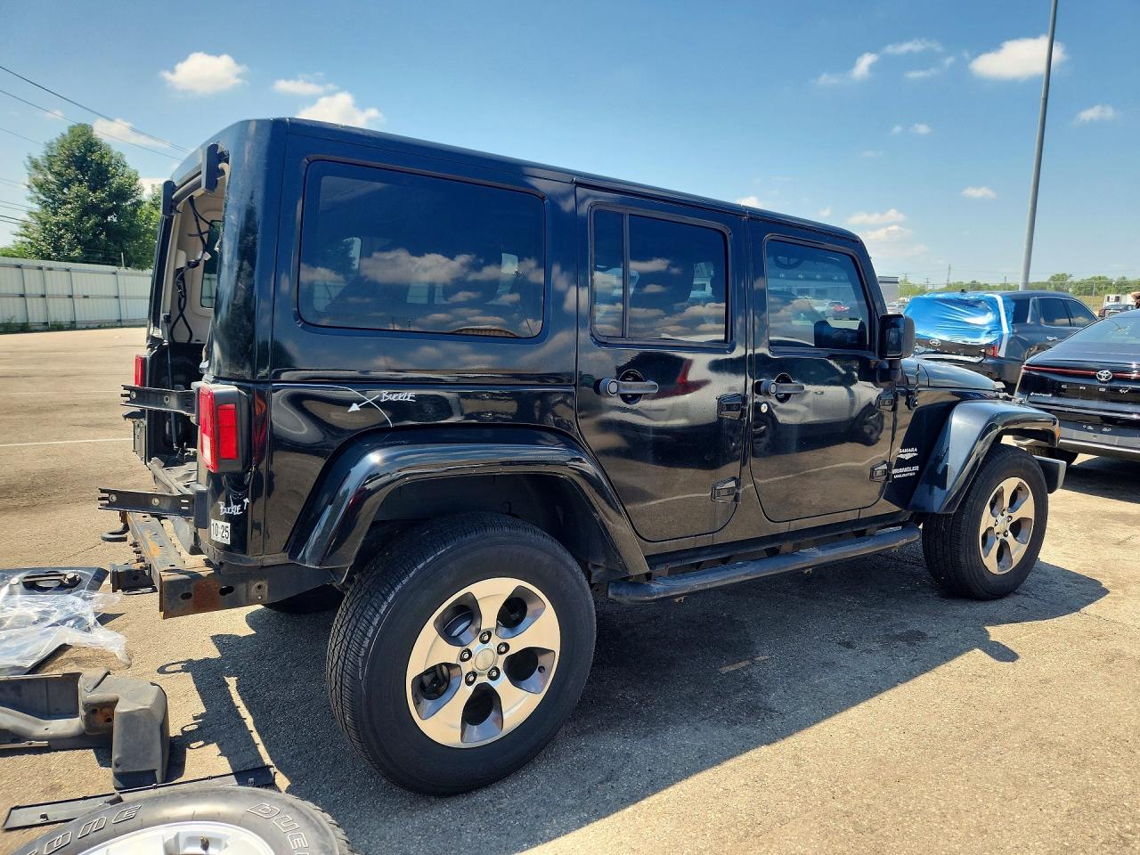 2011 Jeep Wrangler Unlimited Sahara Черный vin: 1J4BA5H17BL616158