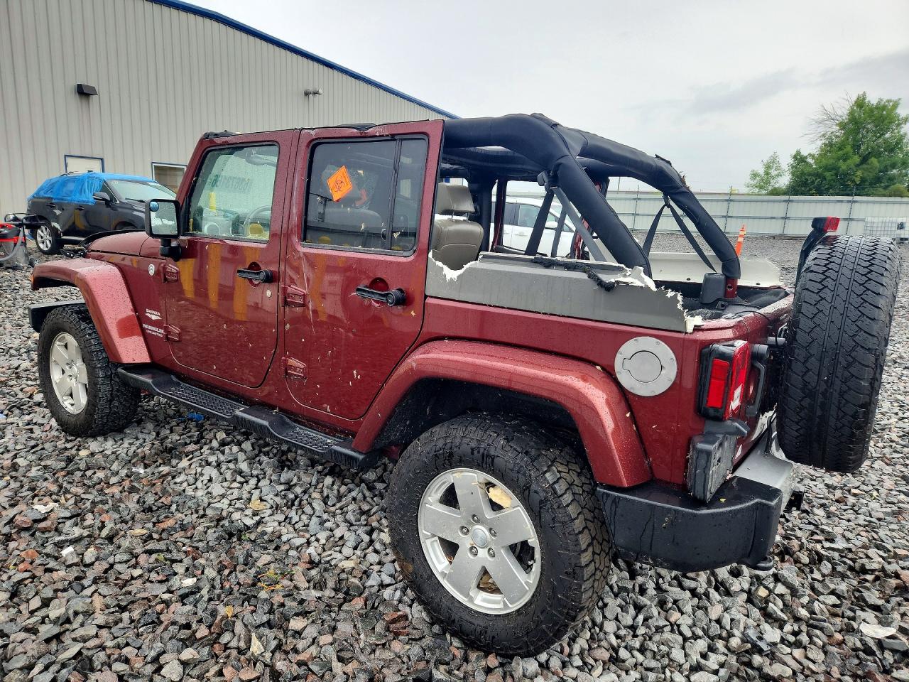 2010 Jeep Wrangler Unlimited Sahara Red vin: 1J4BA5H18AL220450