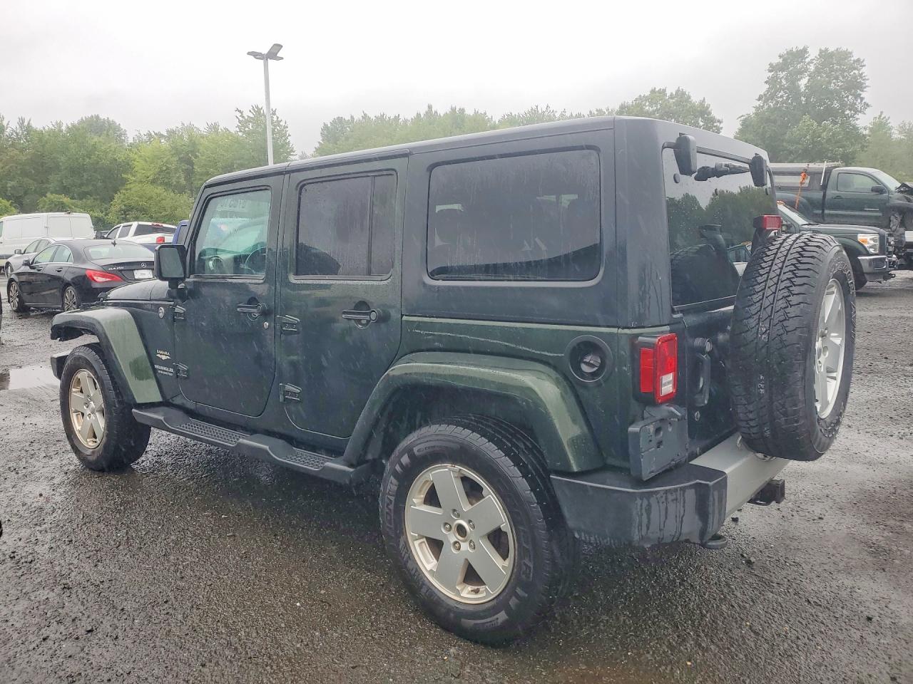 2011 Jeep Wrangler Unlimited Sahara Green vin: 1J4BA5H18BL633972