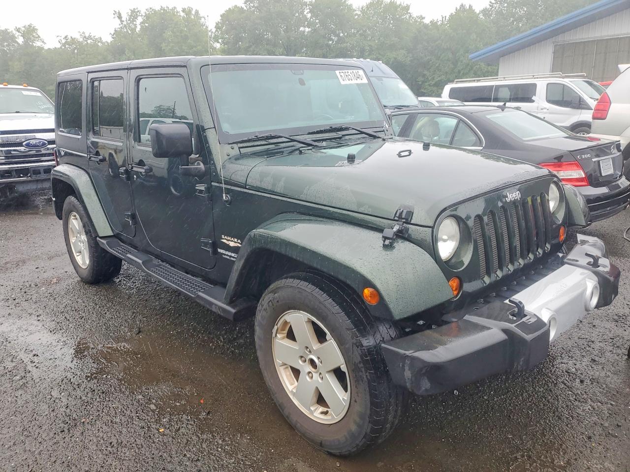 2011 Jeep Wrangler Unlimited Sahara Green vin: 1J4BA5H18BL633972