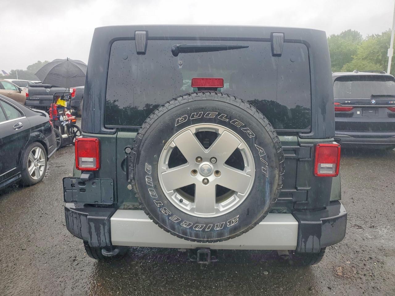 2011 Jeep Wrangler Unlimited Sahara Green vin: 1J4BA5H18BL633972