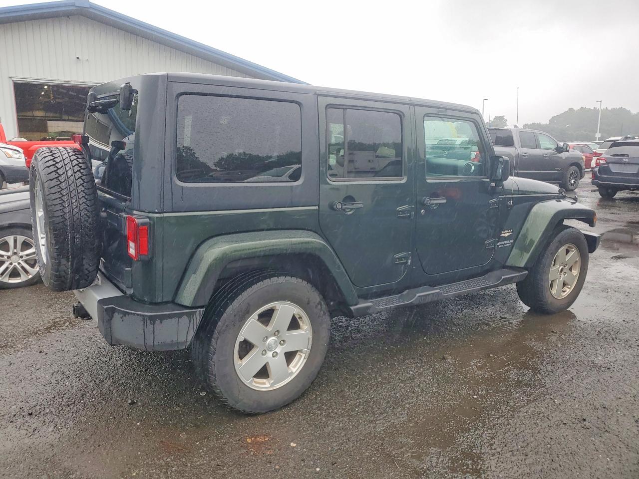 2011 Jeep Wrangler Unlimited Sahara Green vin: 1J4BA5H18BL633972