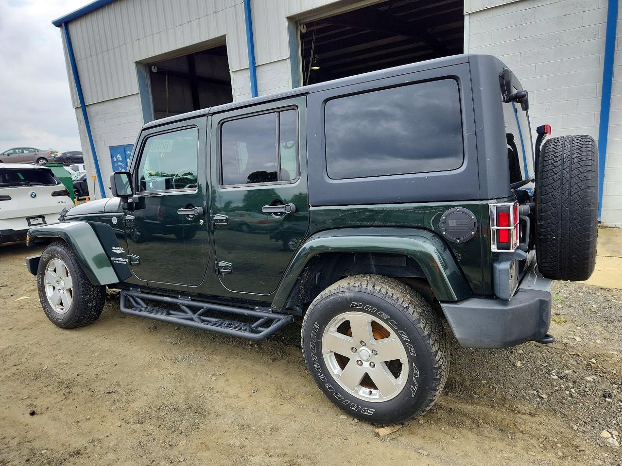 2011 Jeep Wrangler Unlimited Sahara Green vin: 1J4BA5H1XBL532660