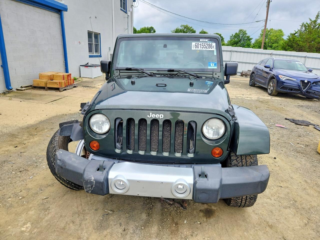 2011 Jeep Wrangler Unlimited Sahara Green vin: 1J4BA5H1XBL532660