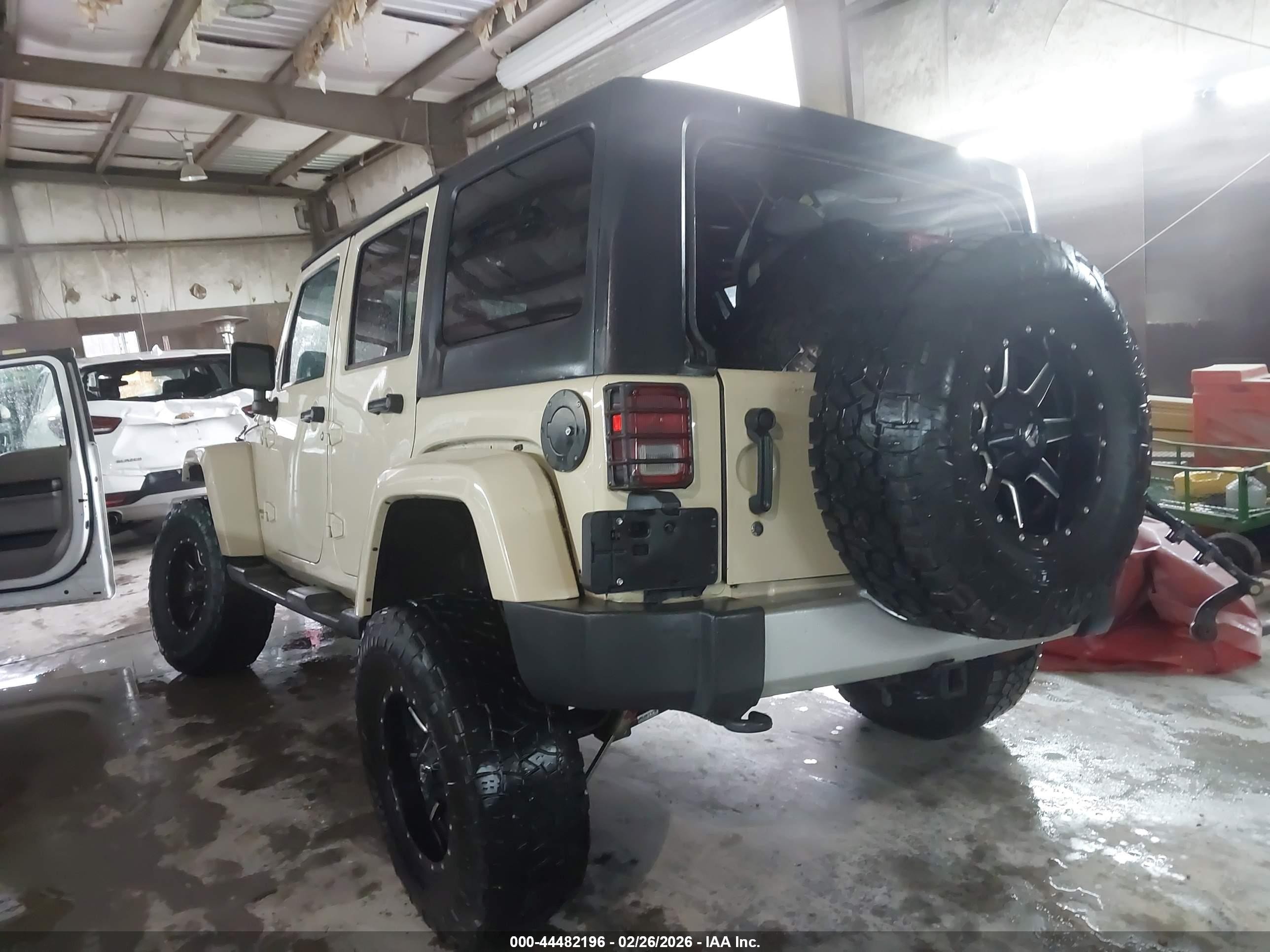 2011 Jeep Wrangler Unlimited Sahara Tan vin: 1J4BA5H1XBL624822