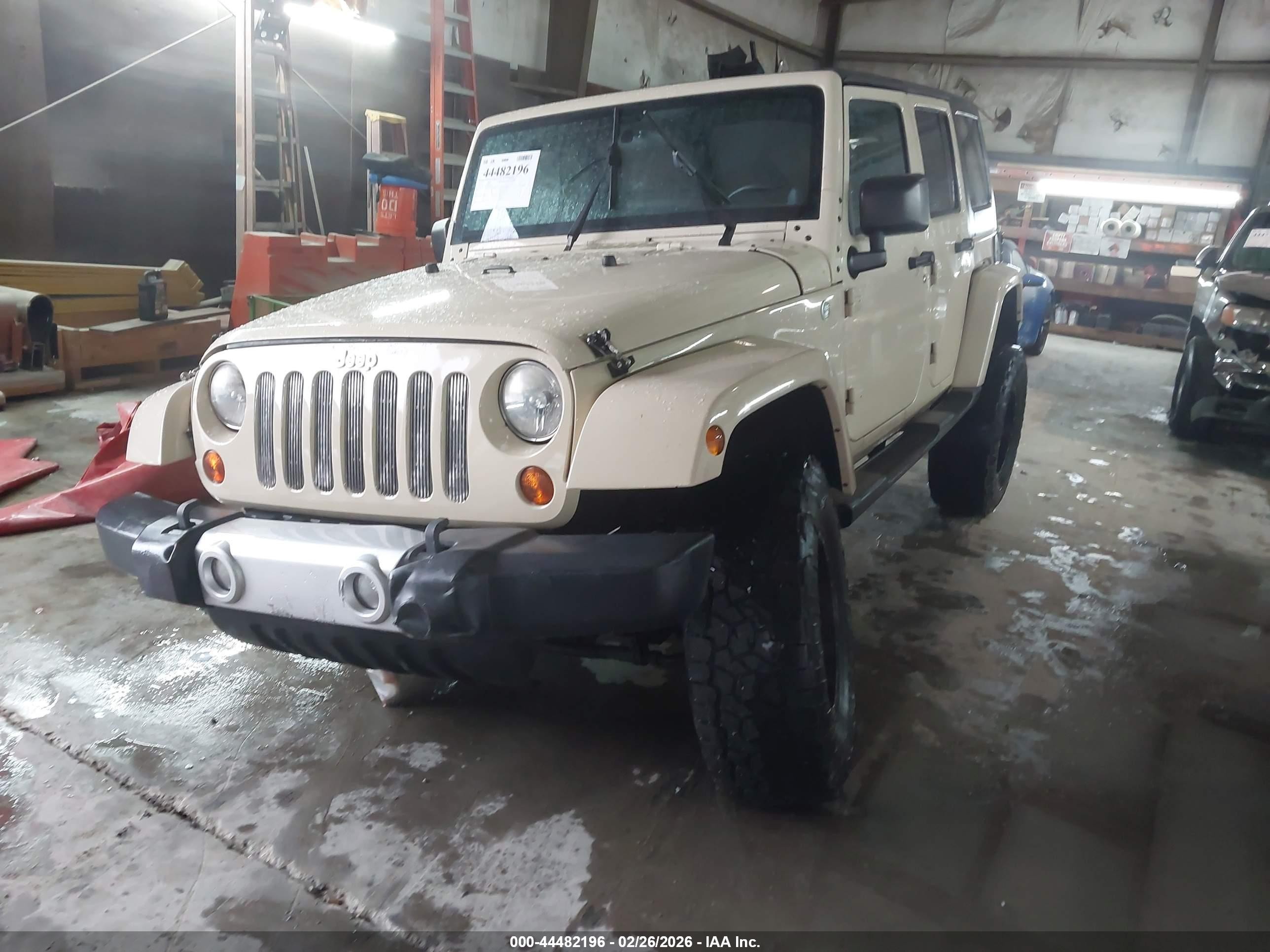 2011 Jeep Wrangler Unlimited Sahara Tan vin: 1J4BA5H1XBL624822