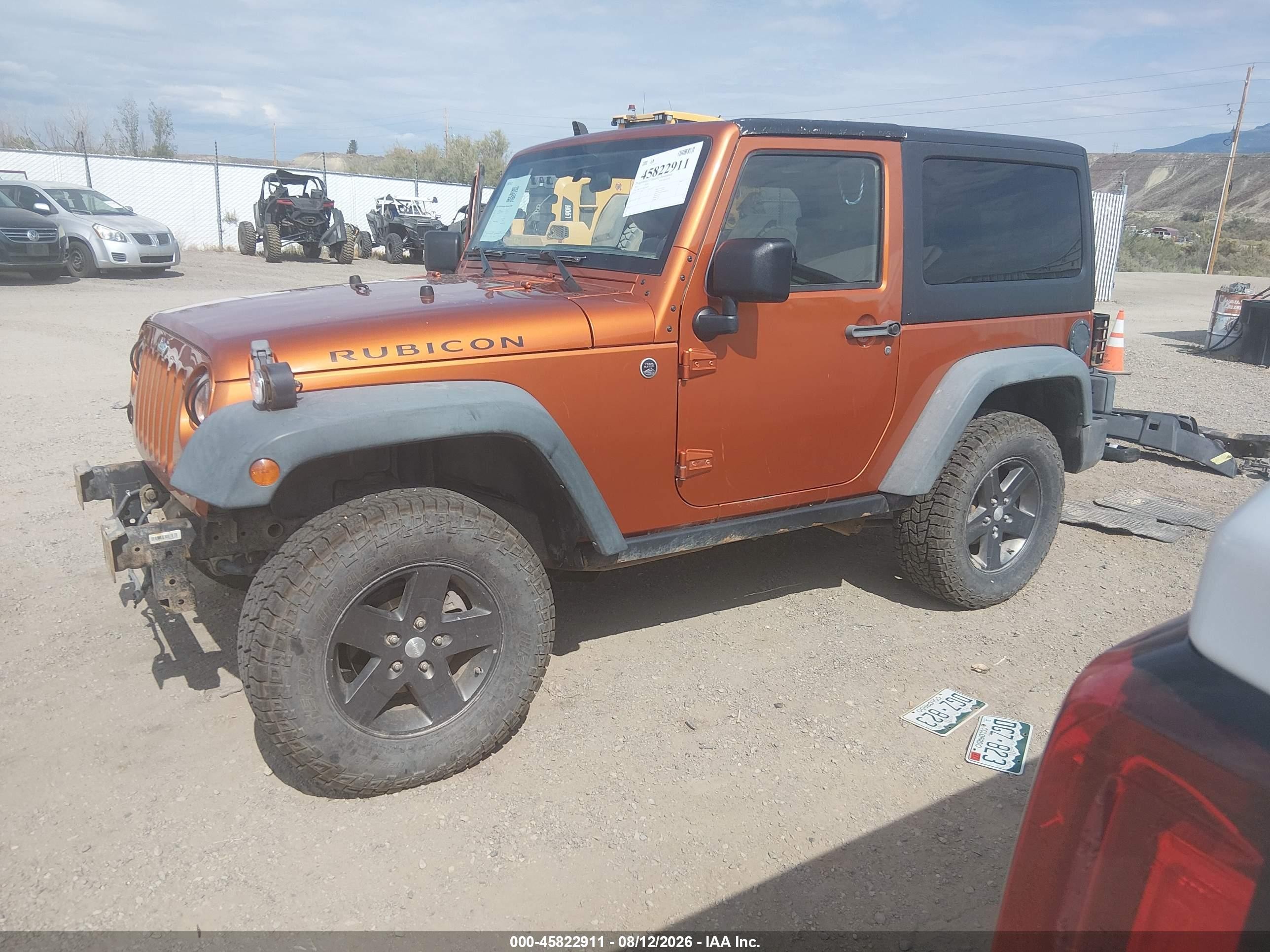 2011 Jeep Wrangler Rubicon Orange vin: 1J4BA6D12BL546192
