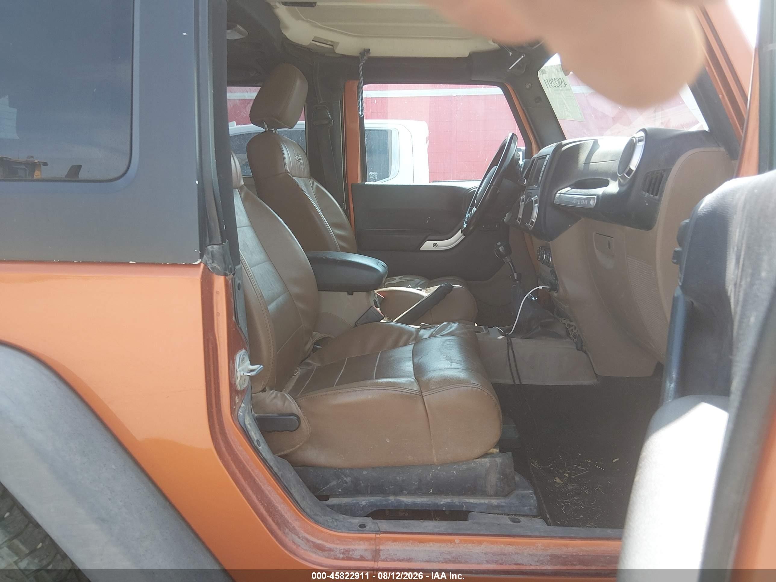 2011 Jeep Wrangler Rubicon Orange vin: 1J4BA6D12BL546192