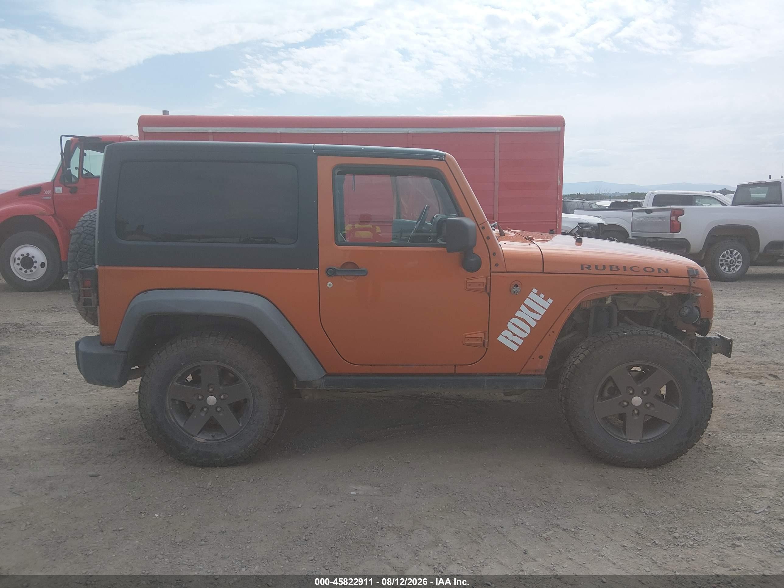 2011 Jeep Wrangler Rubicon Orange vin: 1J4BA6D12BL546192