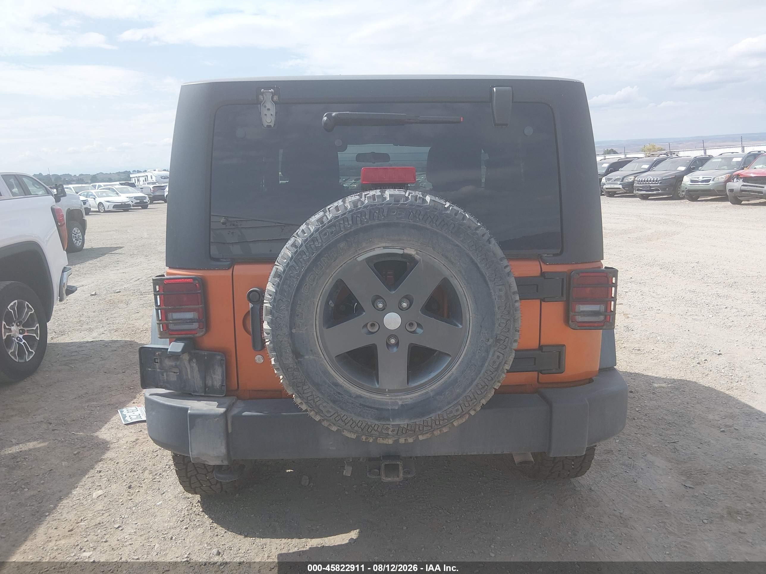2011 Jeep Wrangler Rubicon Orange vin: 1J4BA6D12BL546192