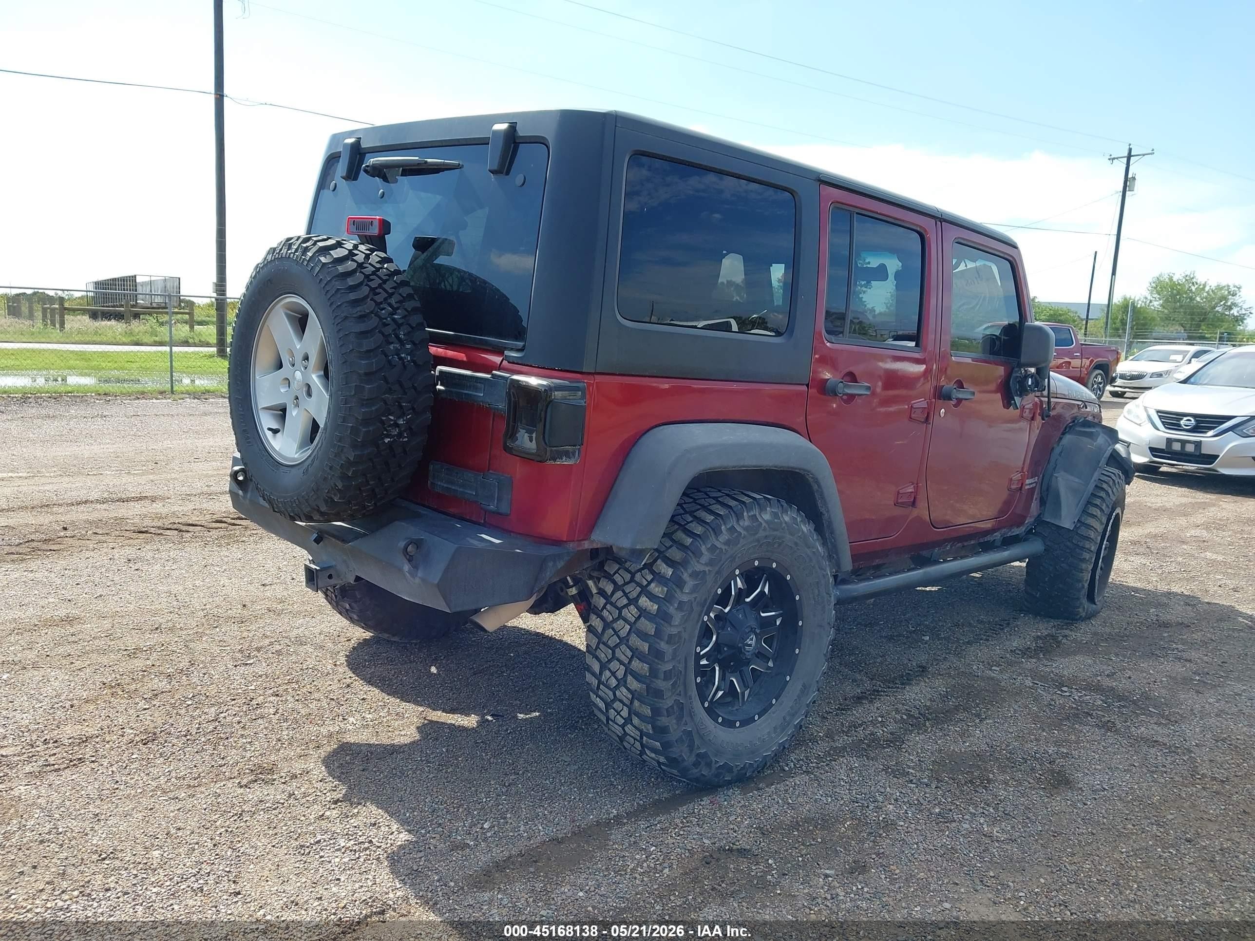 2011 Jeep Wrangler Unlimited Rubicon Red vin: 1J4BA6H11BL584541