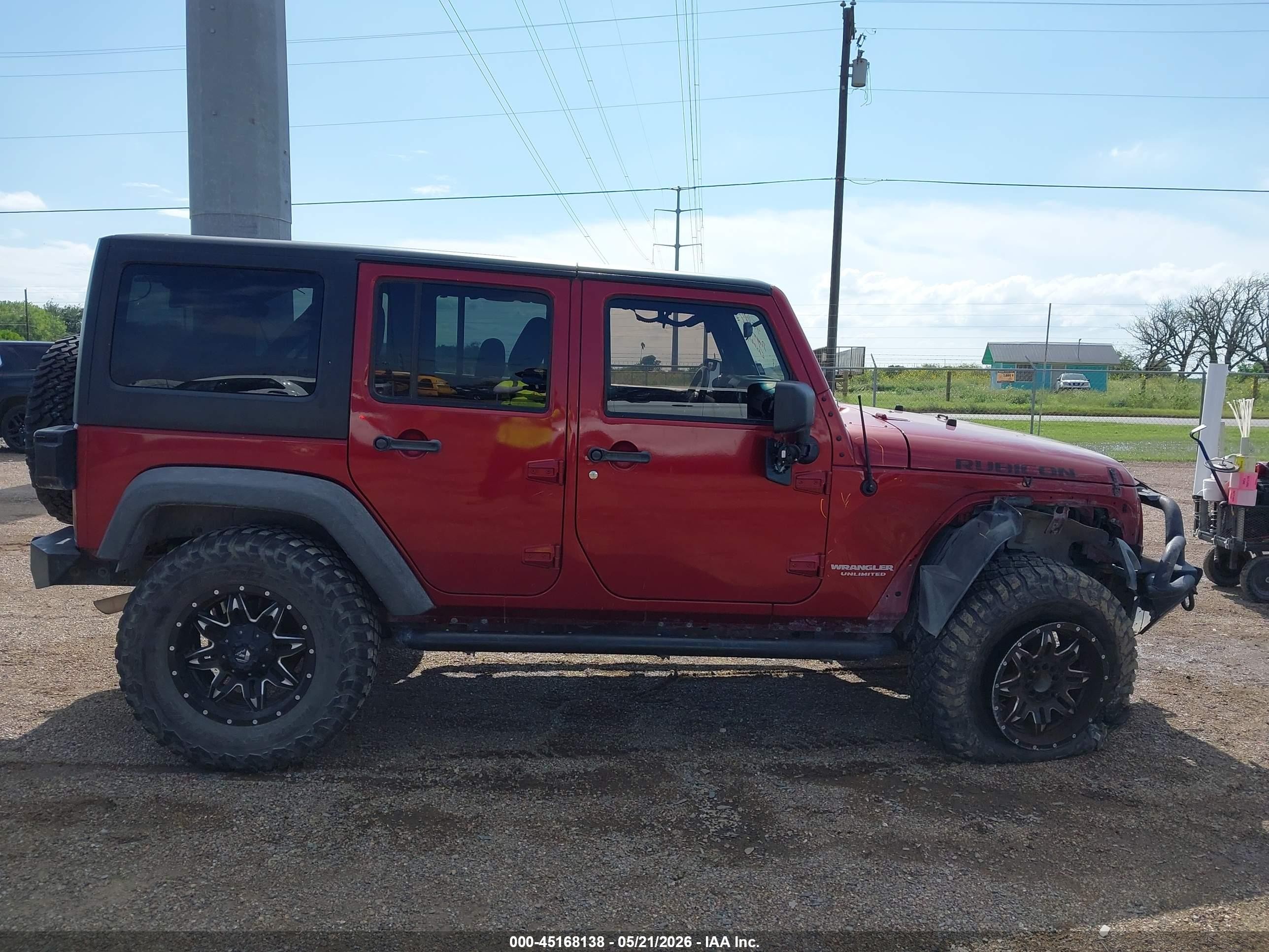 2011 Jeep Wrangler Unlimited Rubicon Red vin: 1J4BA6H11BL584541