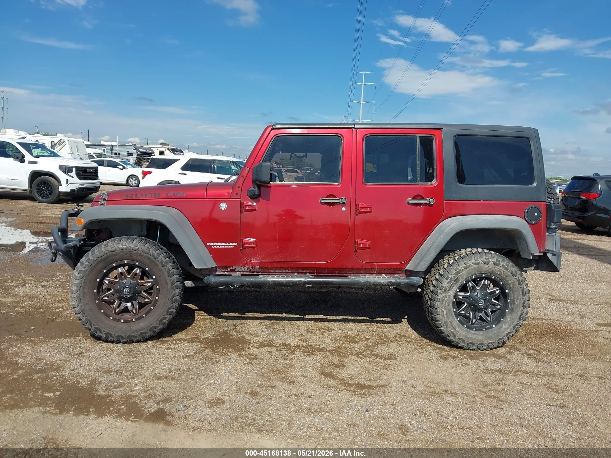 2011 Jeep Wrangler Unlimited Rubicon Red vin: 1J4BA6H11BL584541