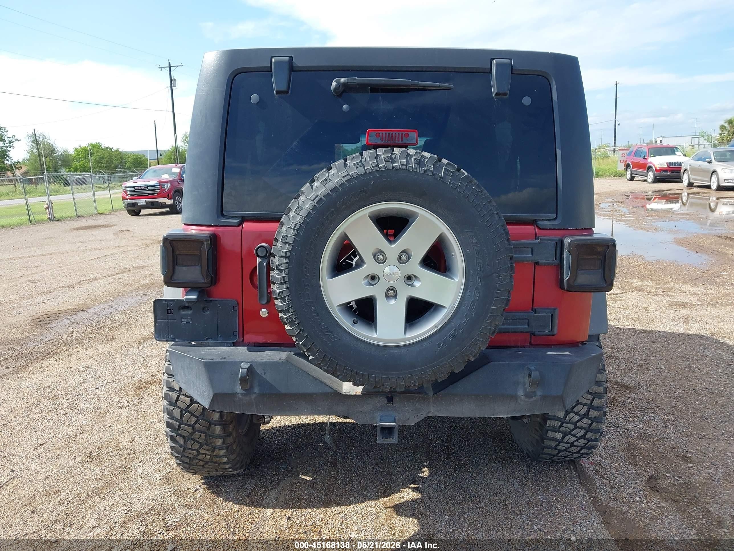 2011 Jeep Wrangler Unlimited Rubicon Red vin: 1J4BA6H11BL584541