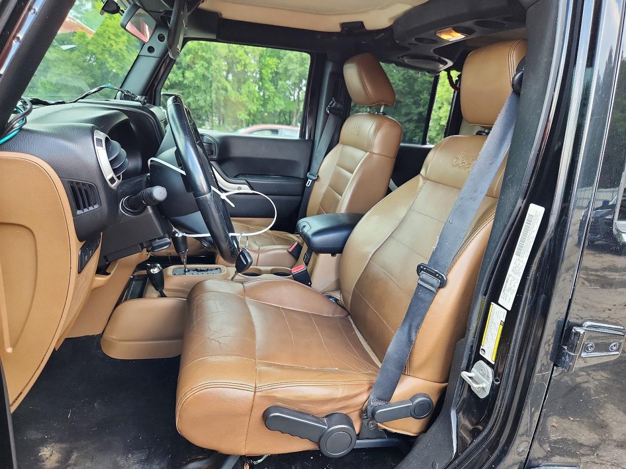 2011 Jeep Wrangler Unlimited Rubicon Black vin: 1J4BA6H12BL567831