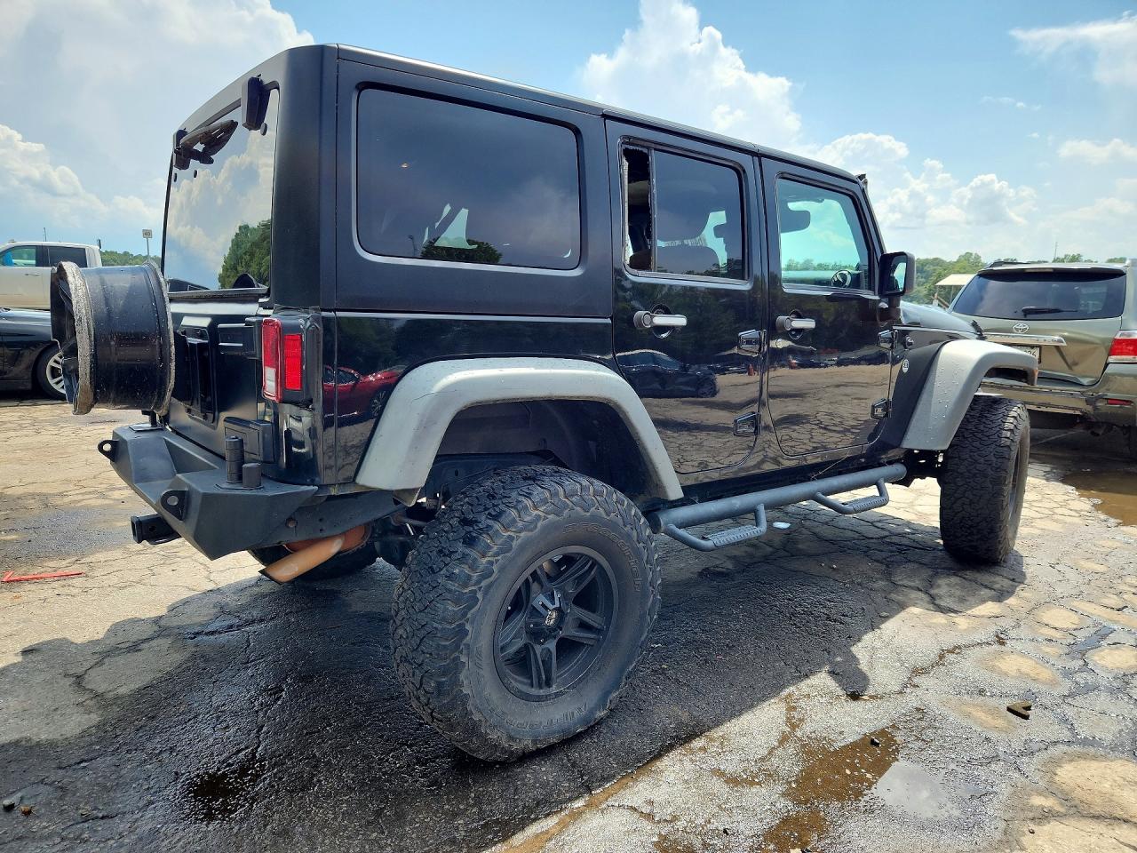 2011 Jeep Wrangler Unlimited Rubicon Black vin: 1J4BA6H12BL567831