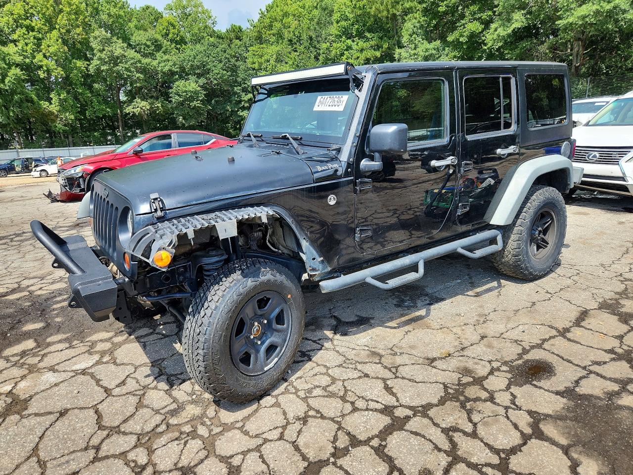 2011 Jeep Wrangler Unlimited Rubicon Black vin: 1J4BA6H12BL567831