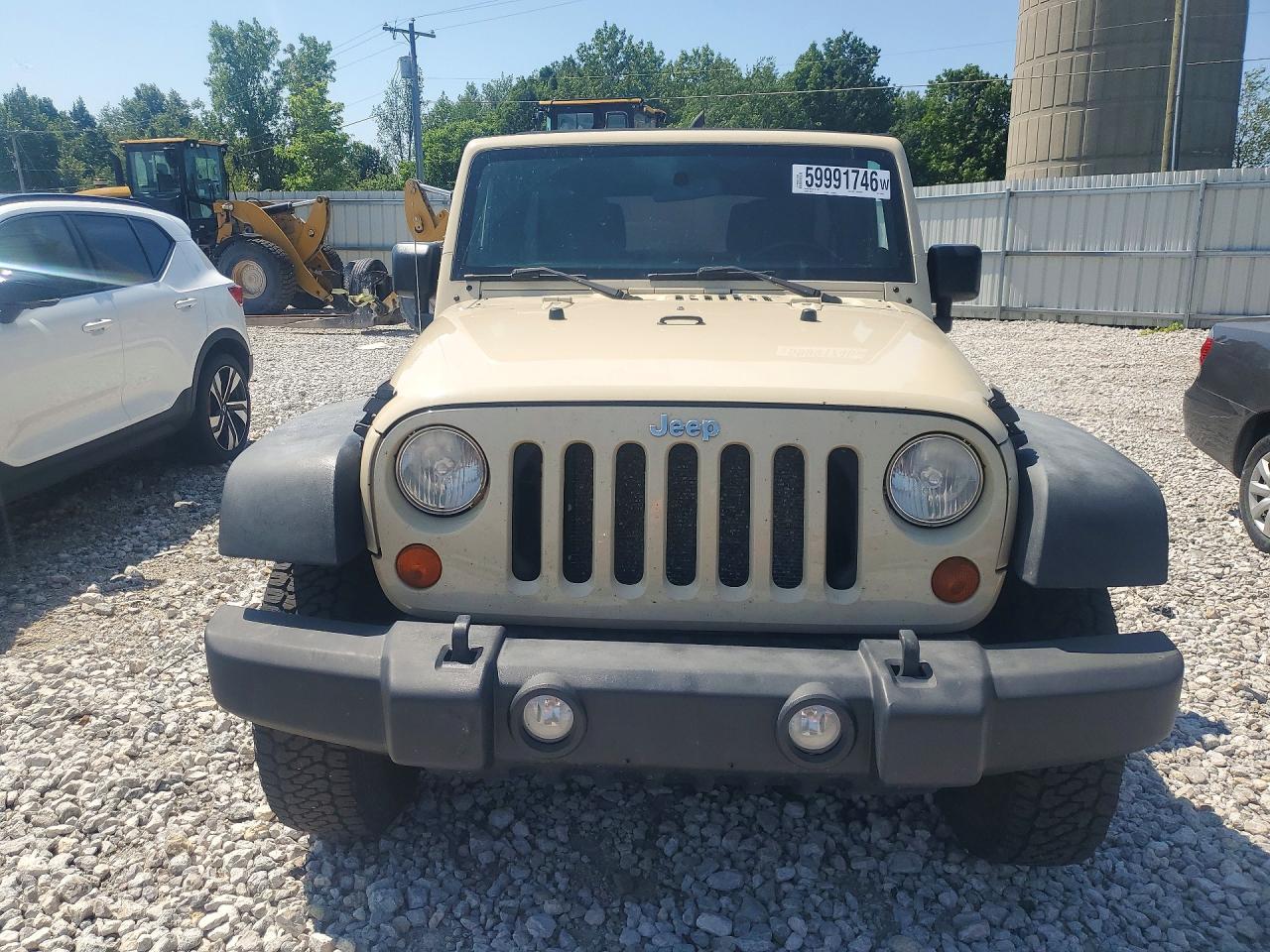 2011 Jeep Wrangler Unlimited Rubicon Бежевый vin: 1J4BA6H13BL598053