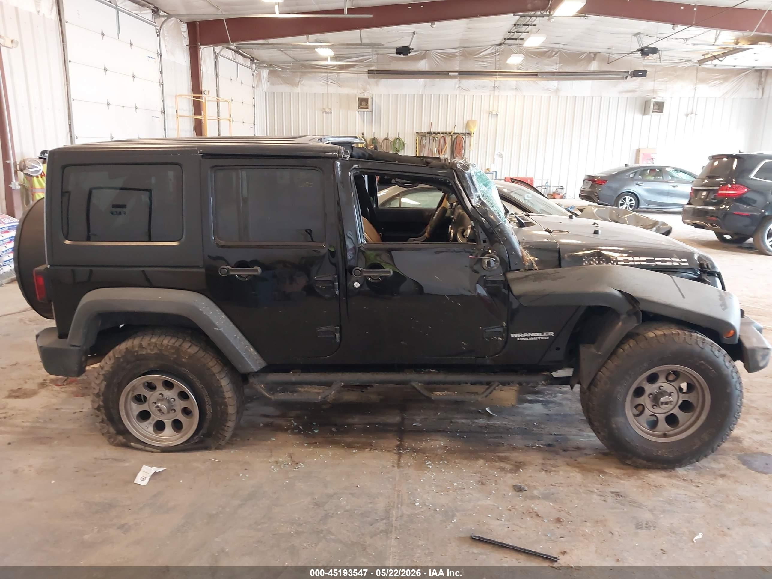 2011 Jeep Wrangler Unlimited Rubicon Черный vin: 1J4BA6H14BL633733
