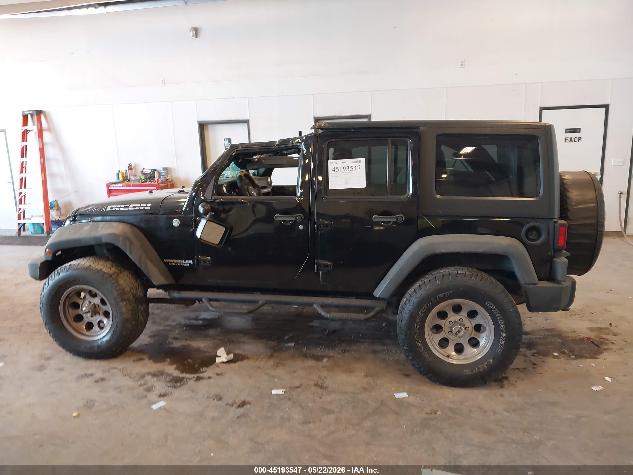 2011 Jeep Wrangler Unlimited Rubicon Черный vin: 1J4BA6H14BL633733