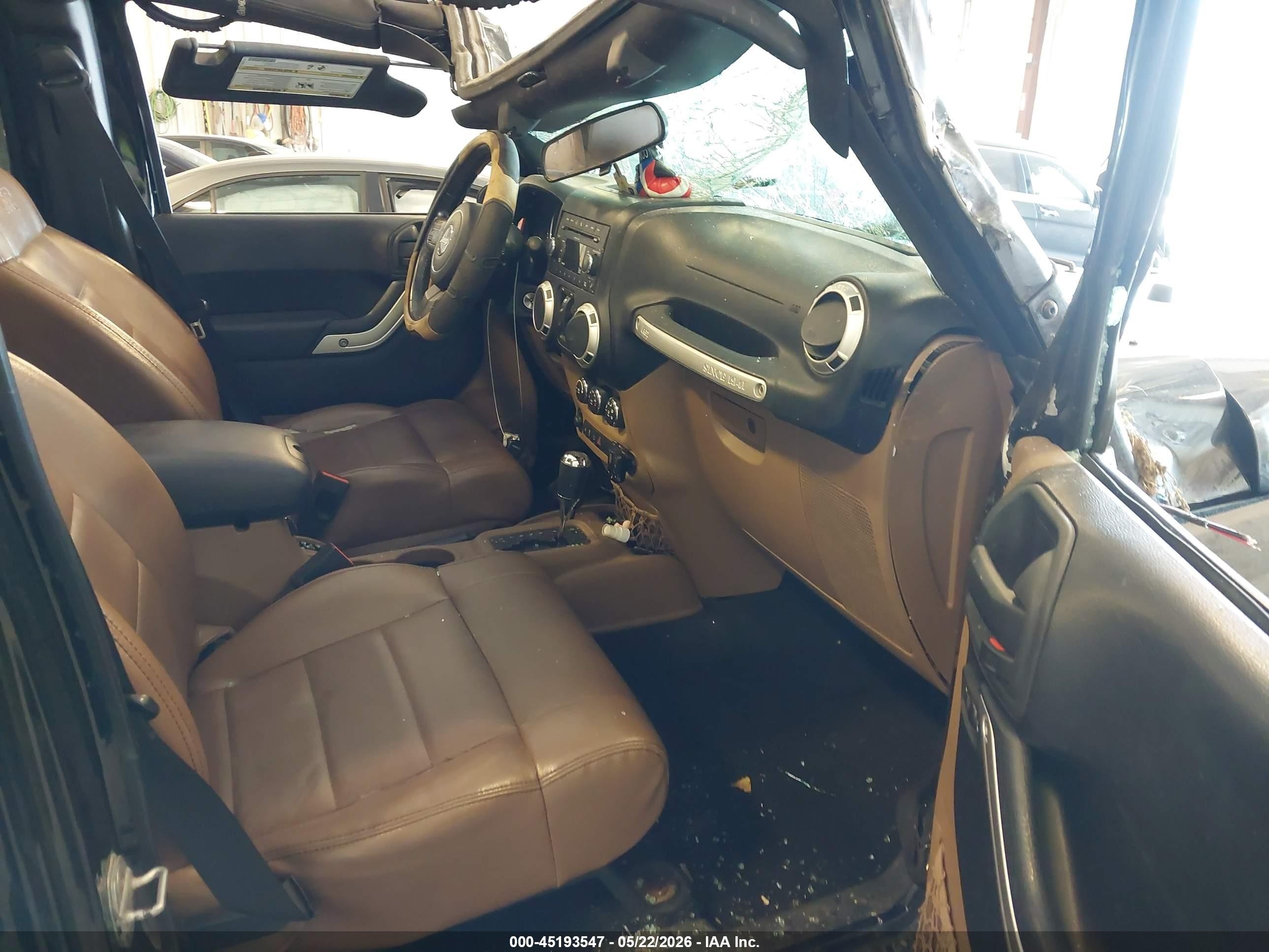 2011 Jeep Wrangler Unlimited Rubicon Черный vin: 1J4BA6H14BL633733