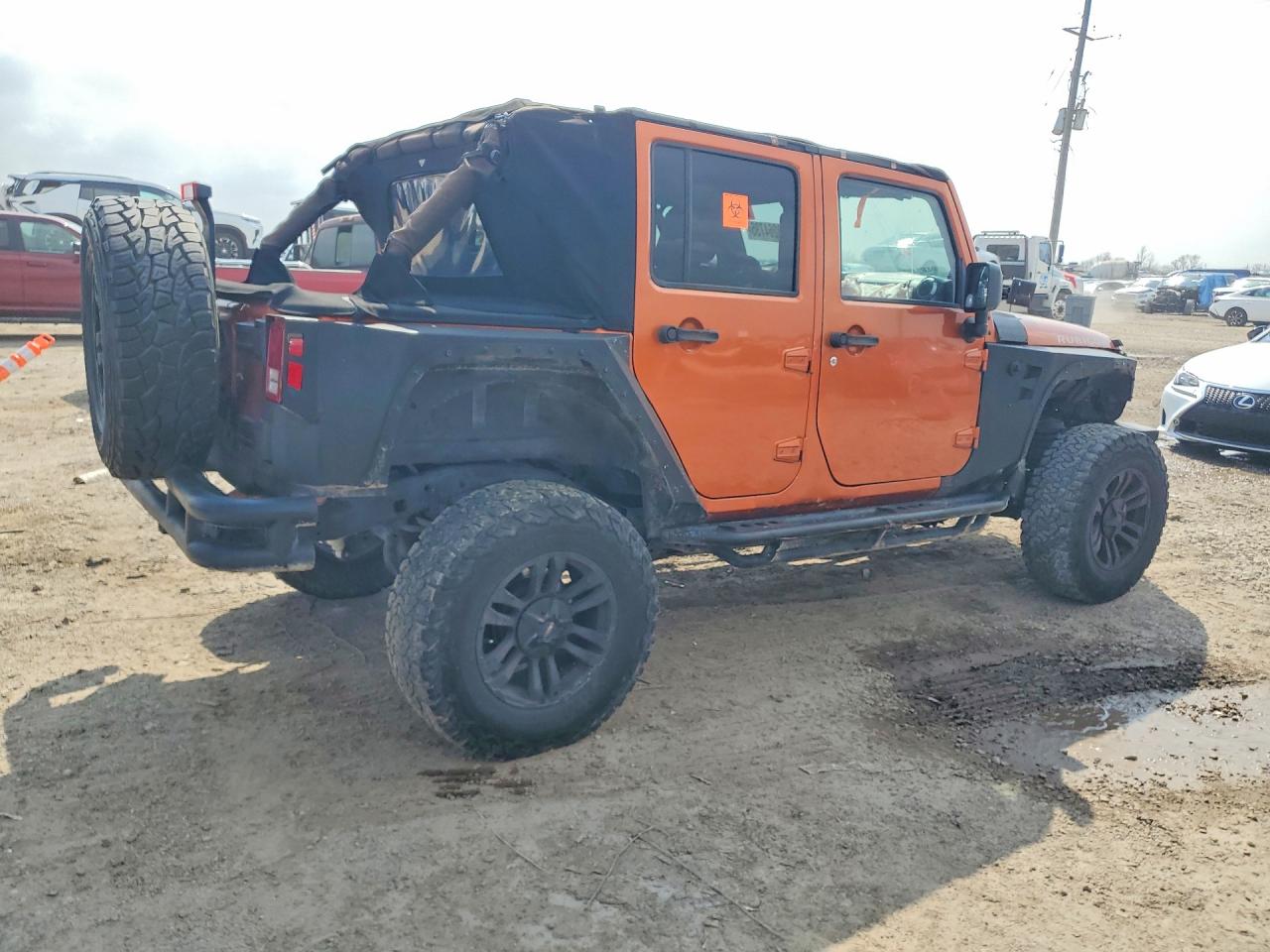 2011 Jeep Wrangler Unlimited Rubicon Orange vin: 1J4BA6H18BL514339