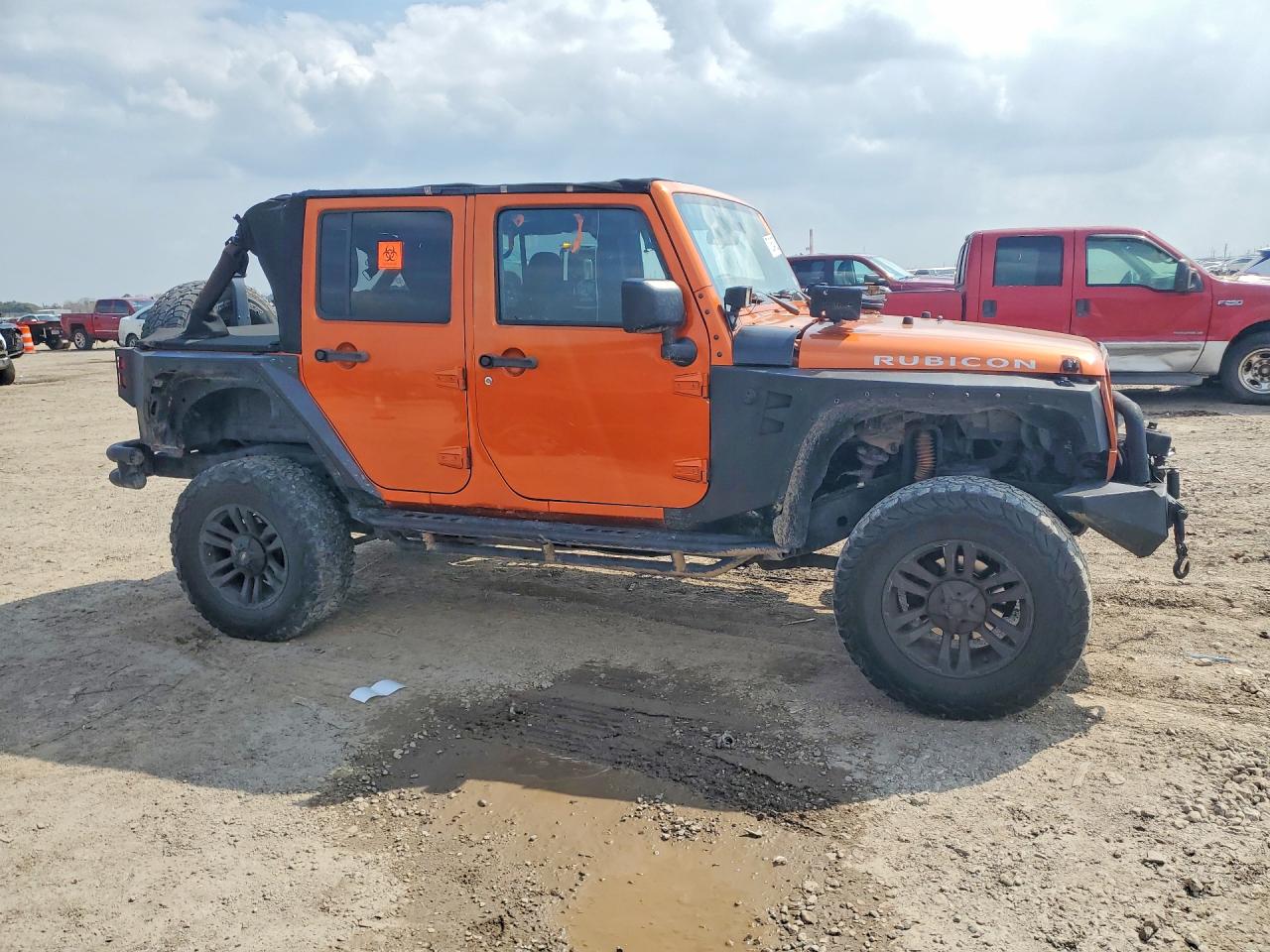 2011 Jeep Wrangler Unlimited Rubicon Orange vin: 1J4BA6H18BL514339