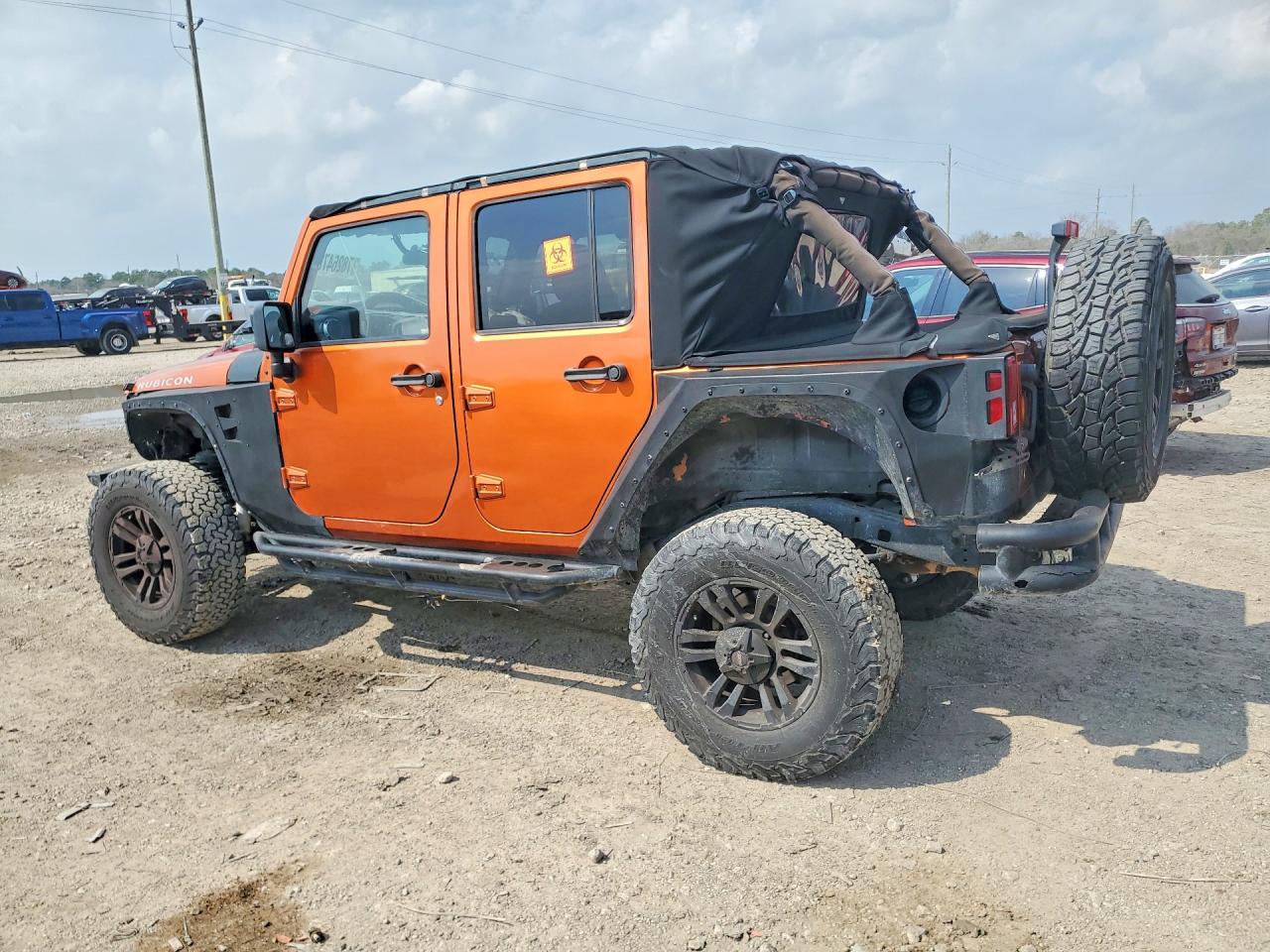 2011 Jeep Wrangler Unlimited Rubicon Orange vin: 1J4BA6H18BL514339