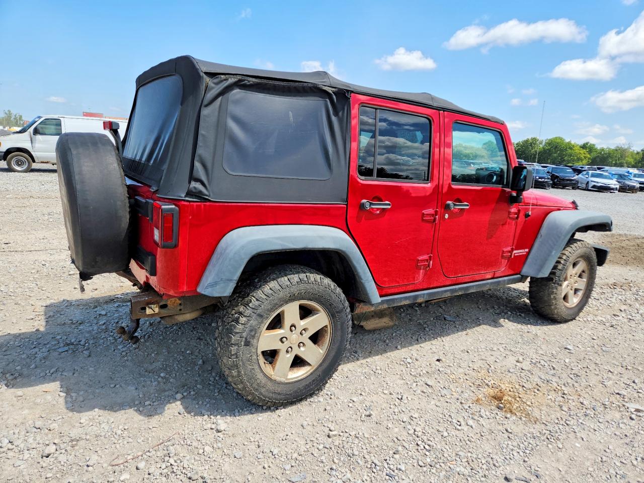 2011 Jeep Wrangler Unlimited Rubicon Red vin: 1J4BA6H18BL559619