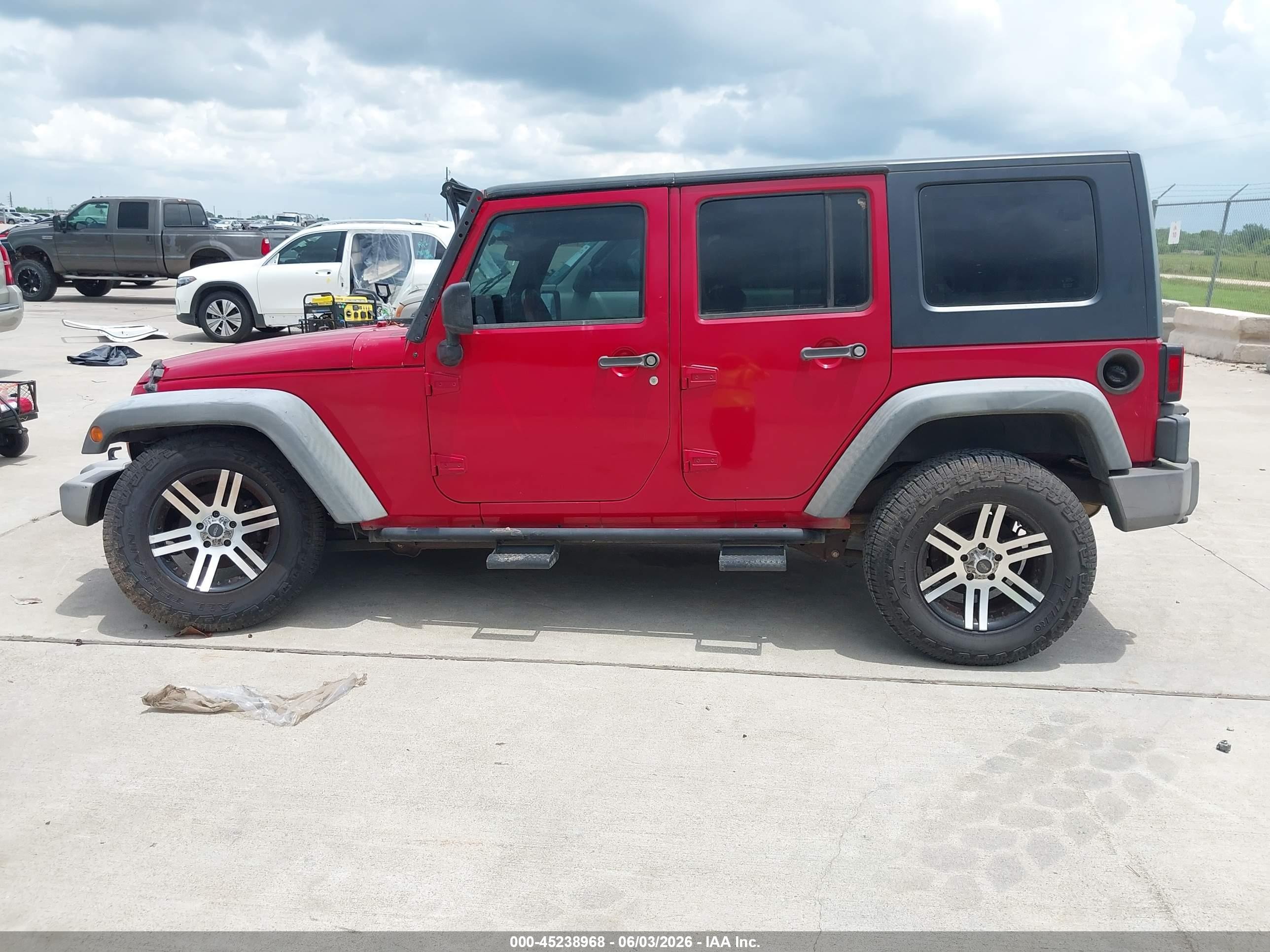 2010 Jeep Wrangler Unlimited Sport Red vin: 1J4BB3H12AL145567