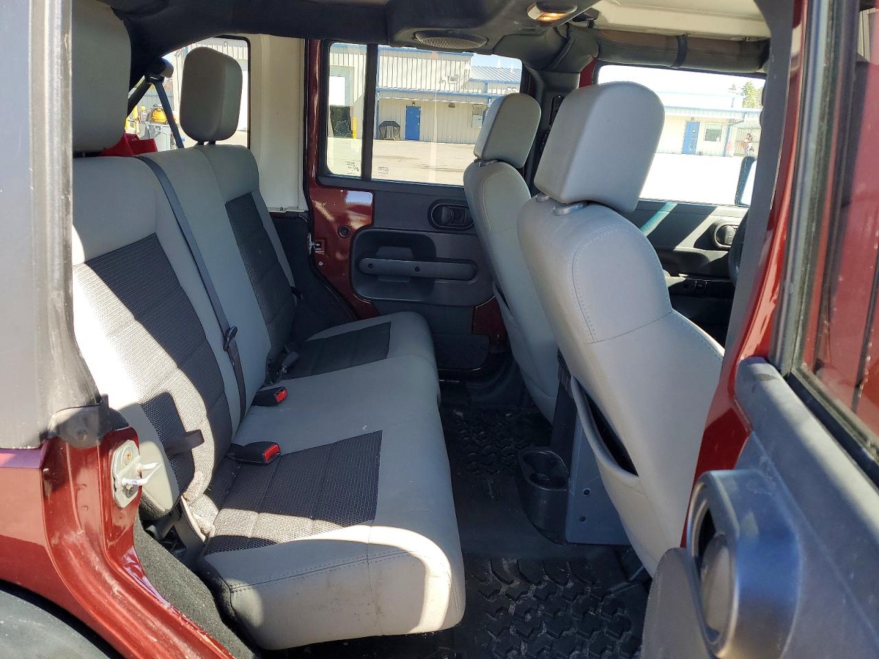 2010 Jeep Wrangler Unlimited Sport Burgundy vin: 1J4BB3H13AL232152