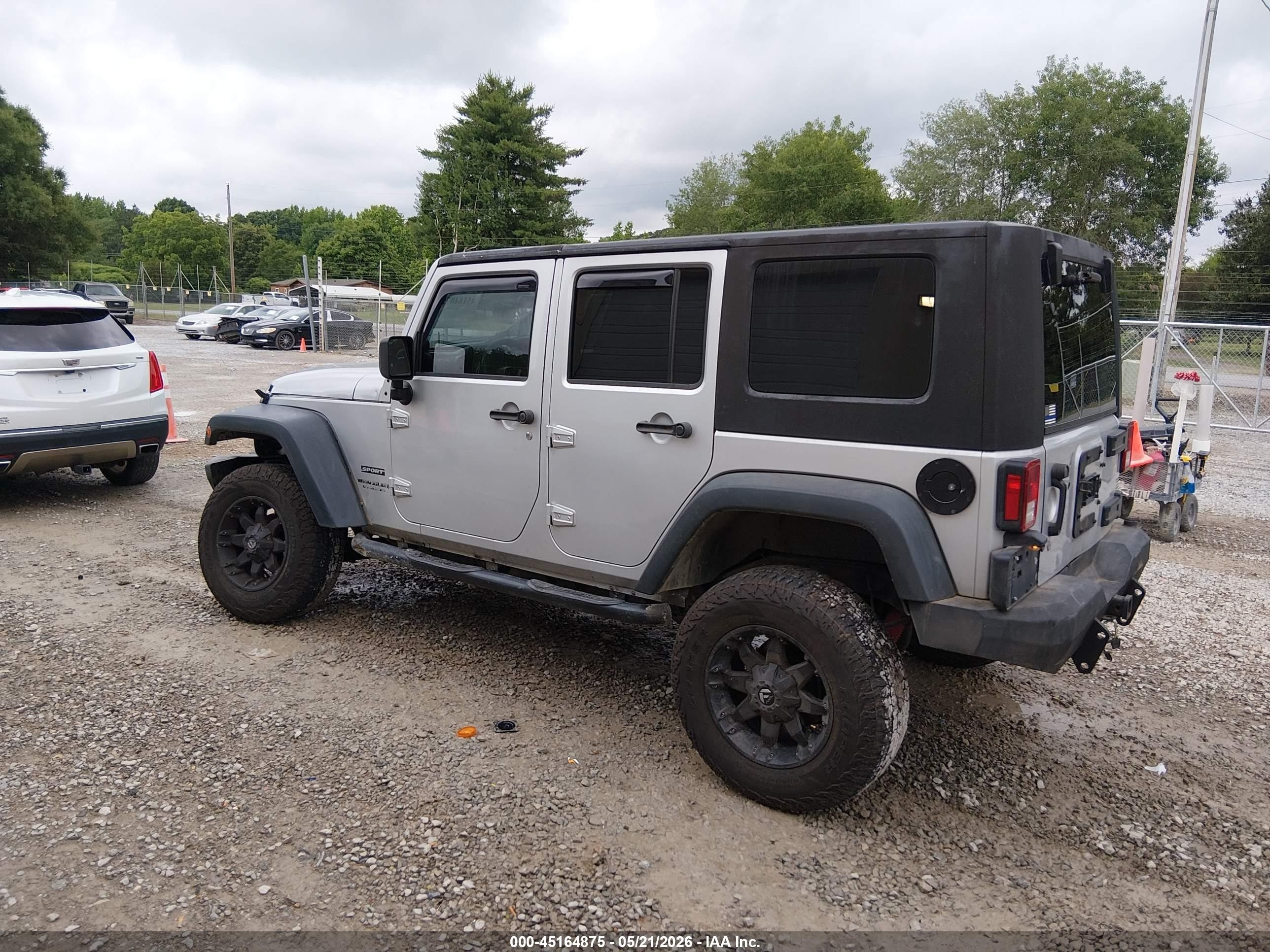 2010 Jeep Wrangler Unlimited Sport Silver vin: 1J4BB3H14AL134604