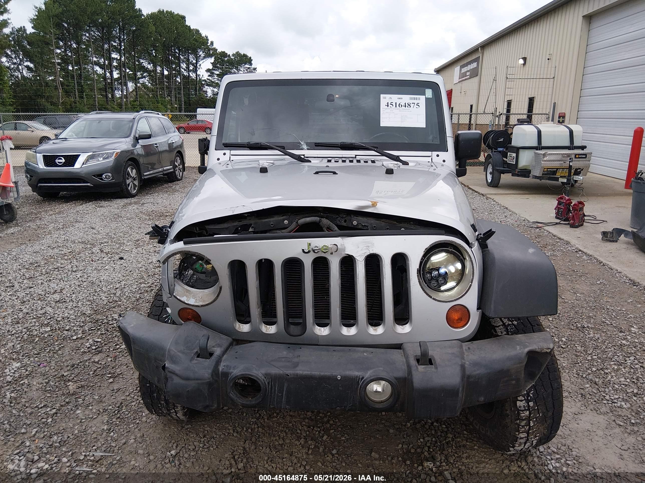 2010 Jeep Wrangler Unlimited Sport Silver vin: 1J4BB3H14AL134604