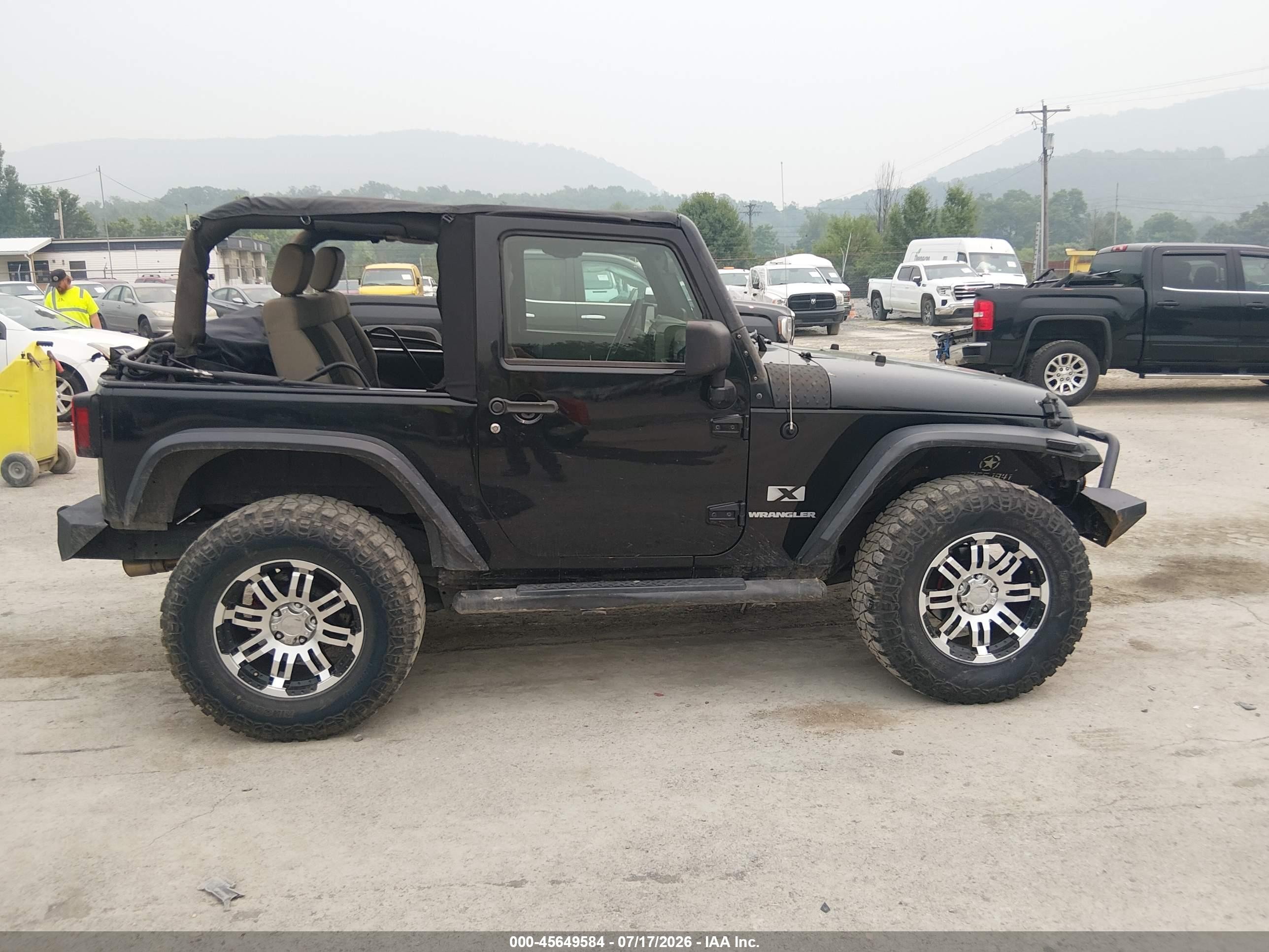 2009 Jeep Wrangler X Черный vin: 1J4FA24109L741468