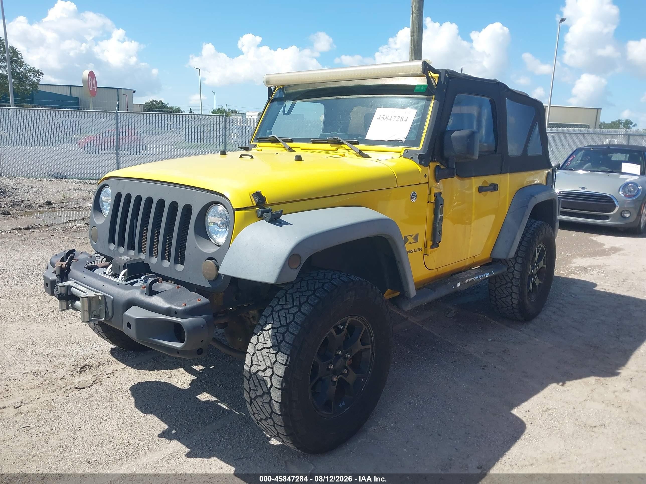 2008 Jeep Wrangler X Yellow vin: 1J4FA24138L579429