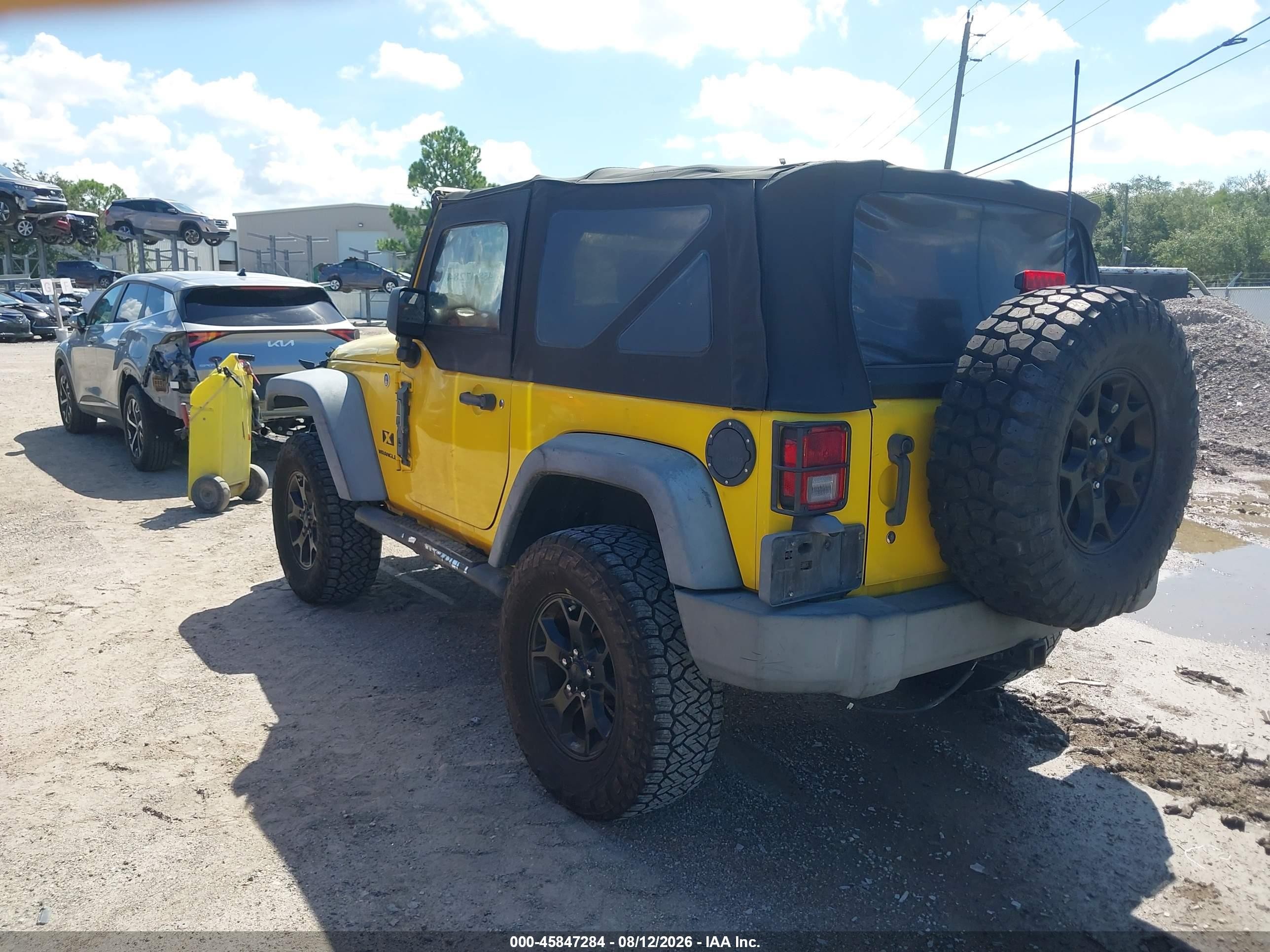 2008 Jeep Wrangler X Yellow vin: 1J4FA24138L579429
