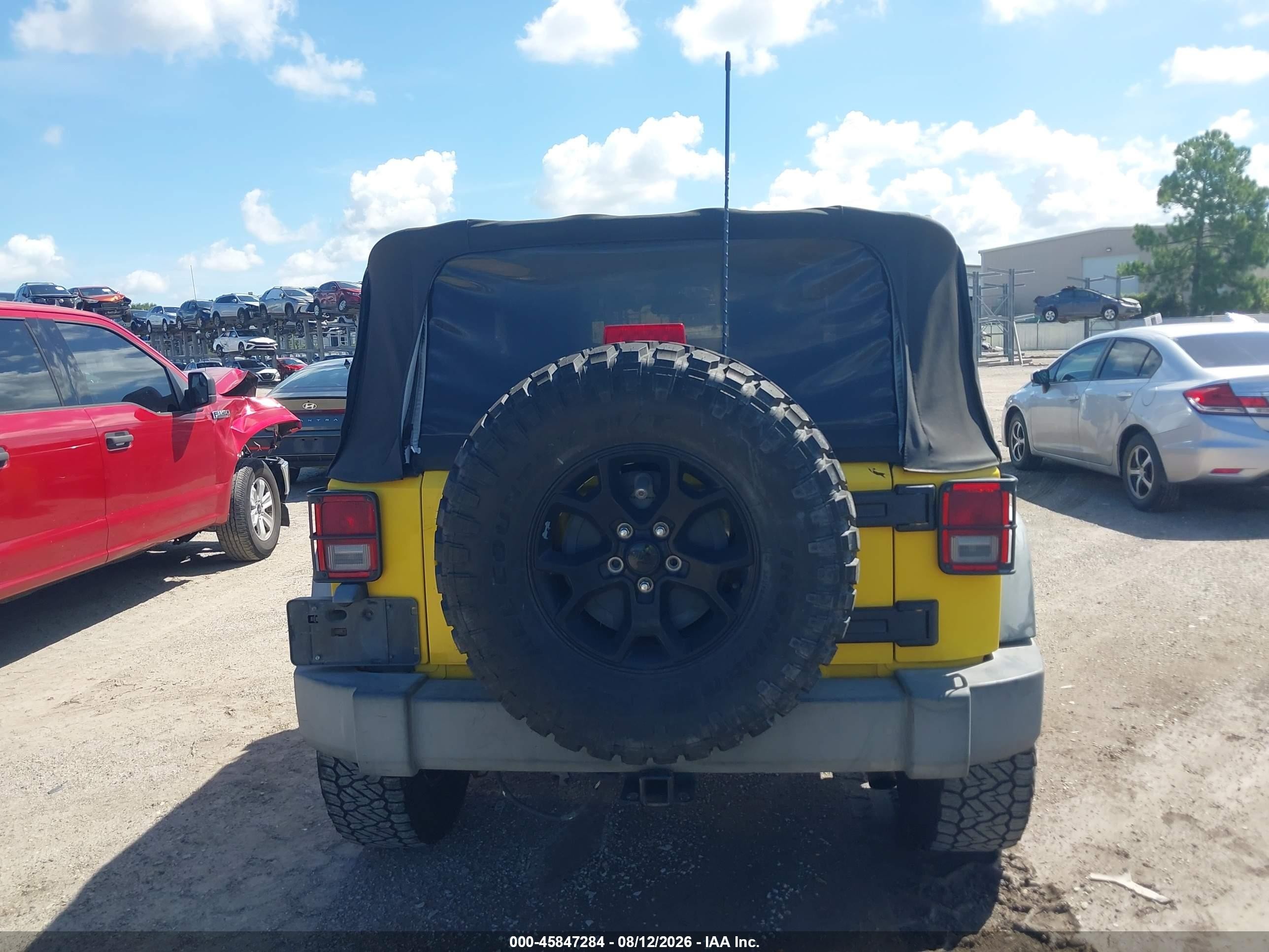 2008 Jeep Wrangler X Yellow vin: 1J4FA24138L579429