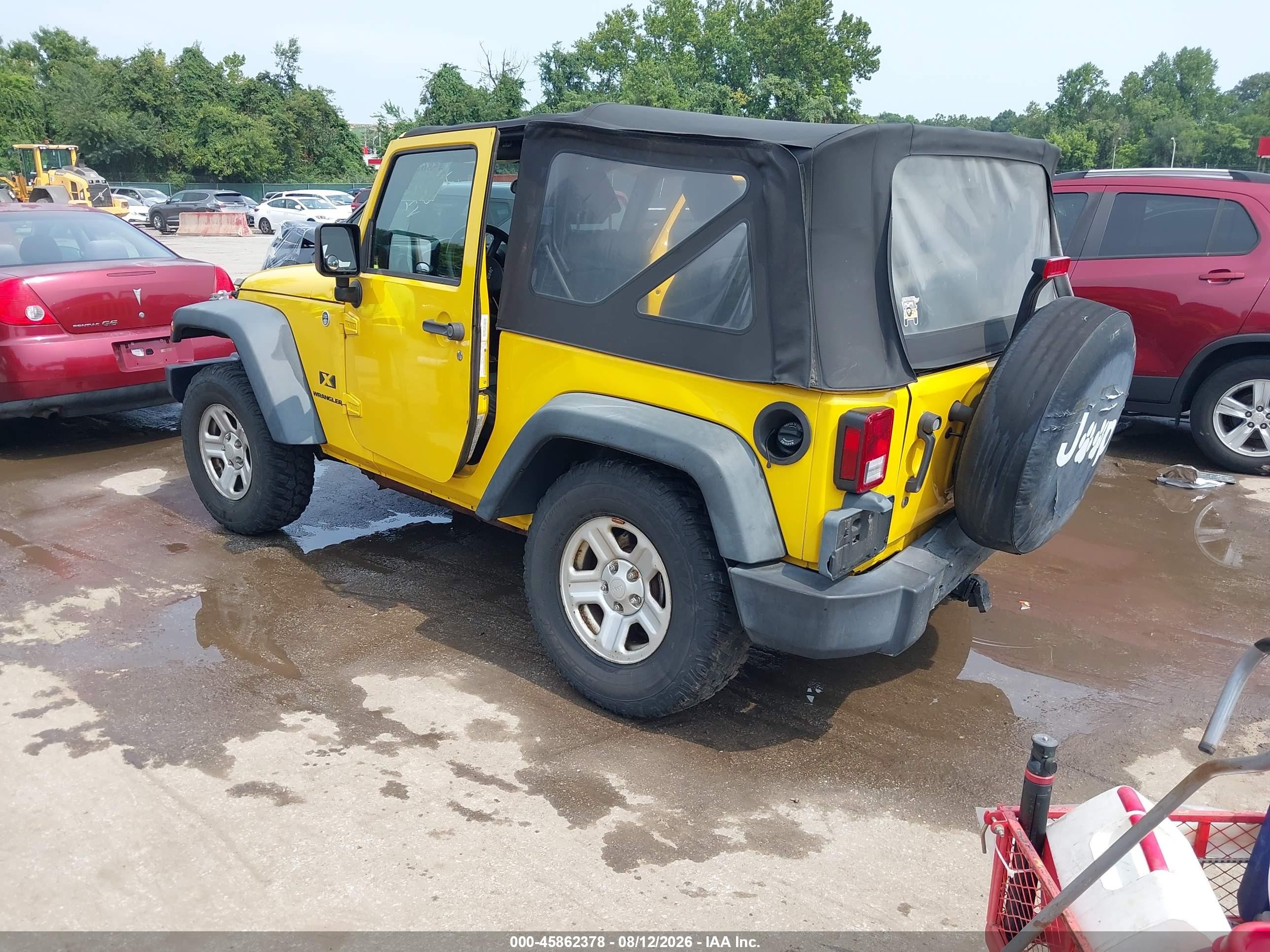 2009 Jeep Wrangler X Yellow vin: 1J4FA24179L756369
