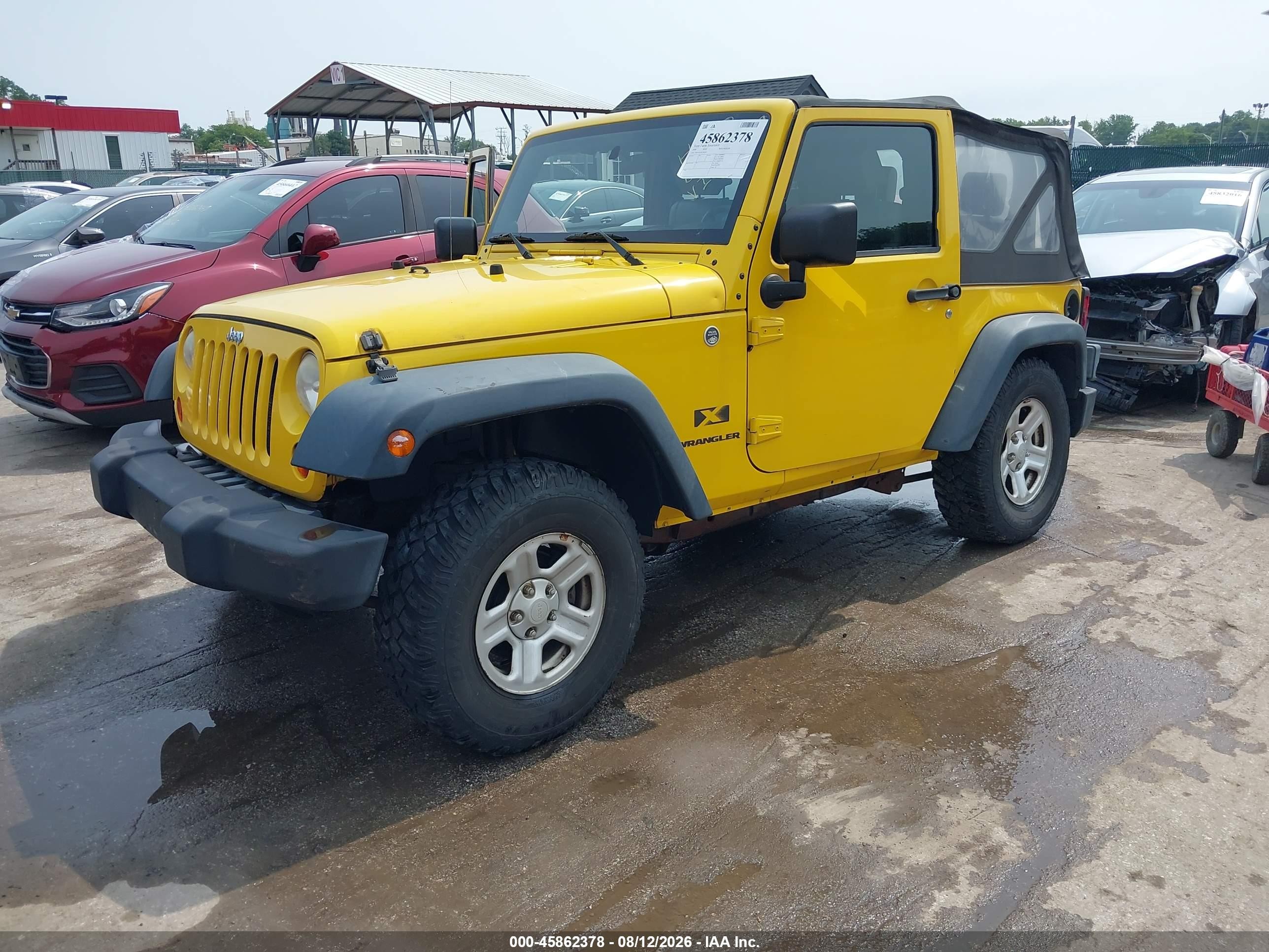 2009 Jeep Wrangler X Yellow vin: 1J4FA24179L756369