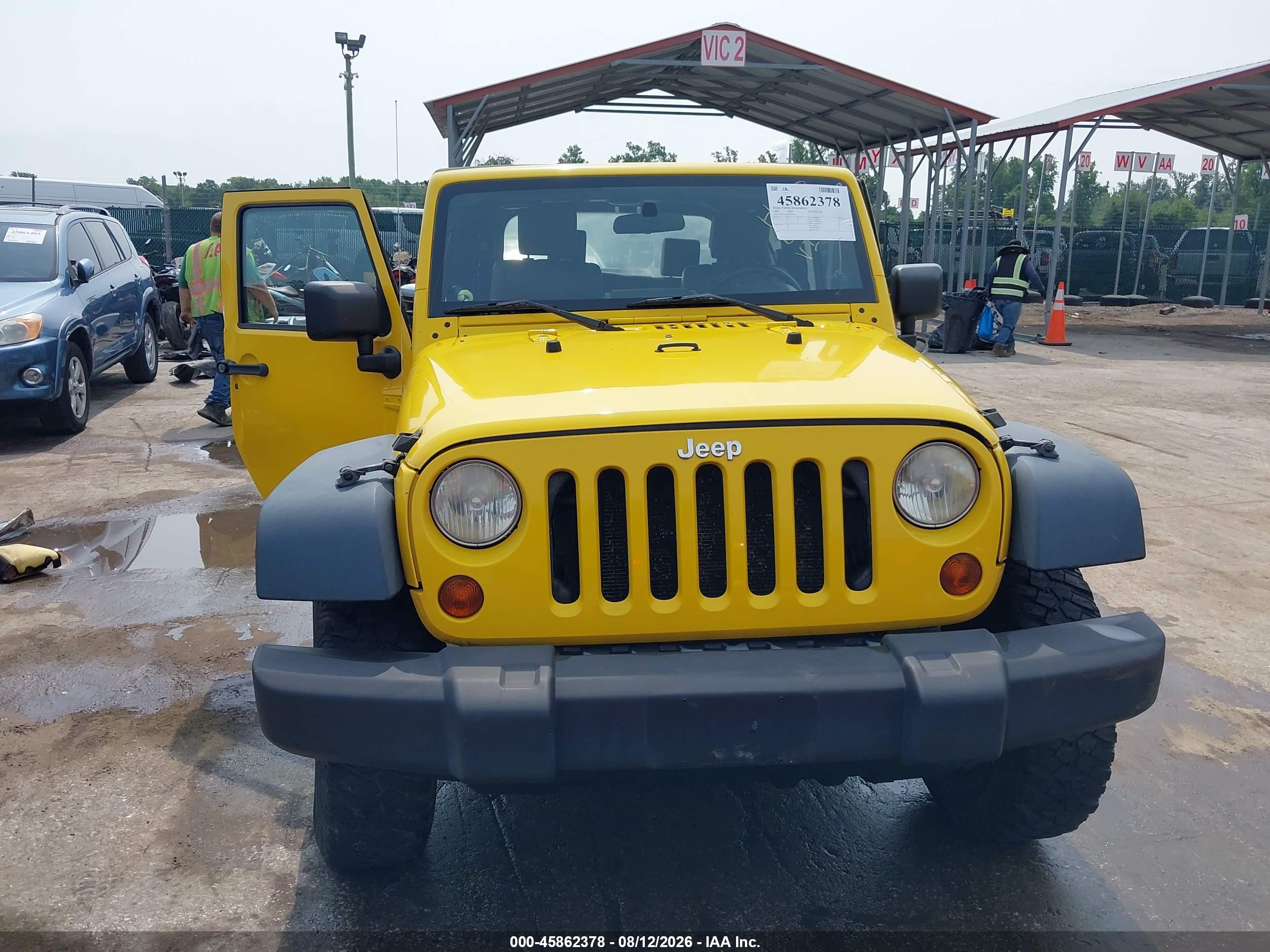 2009 Jeep Wrangler X Yellow vin: 1J4FA24179L756369