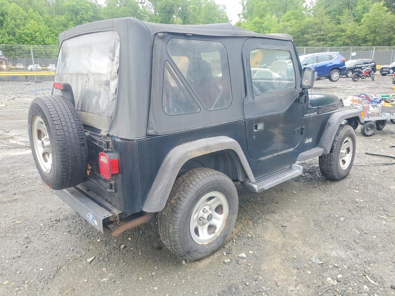 2001 Jeep Wrangler / Tj Se Black vin: 1J4FA29P61P343207